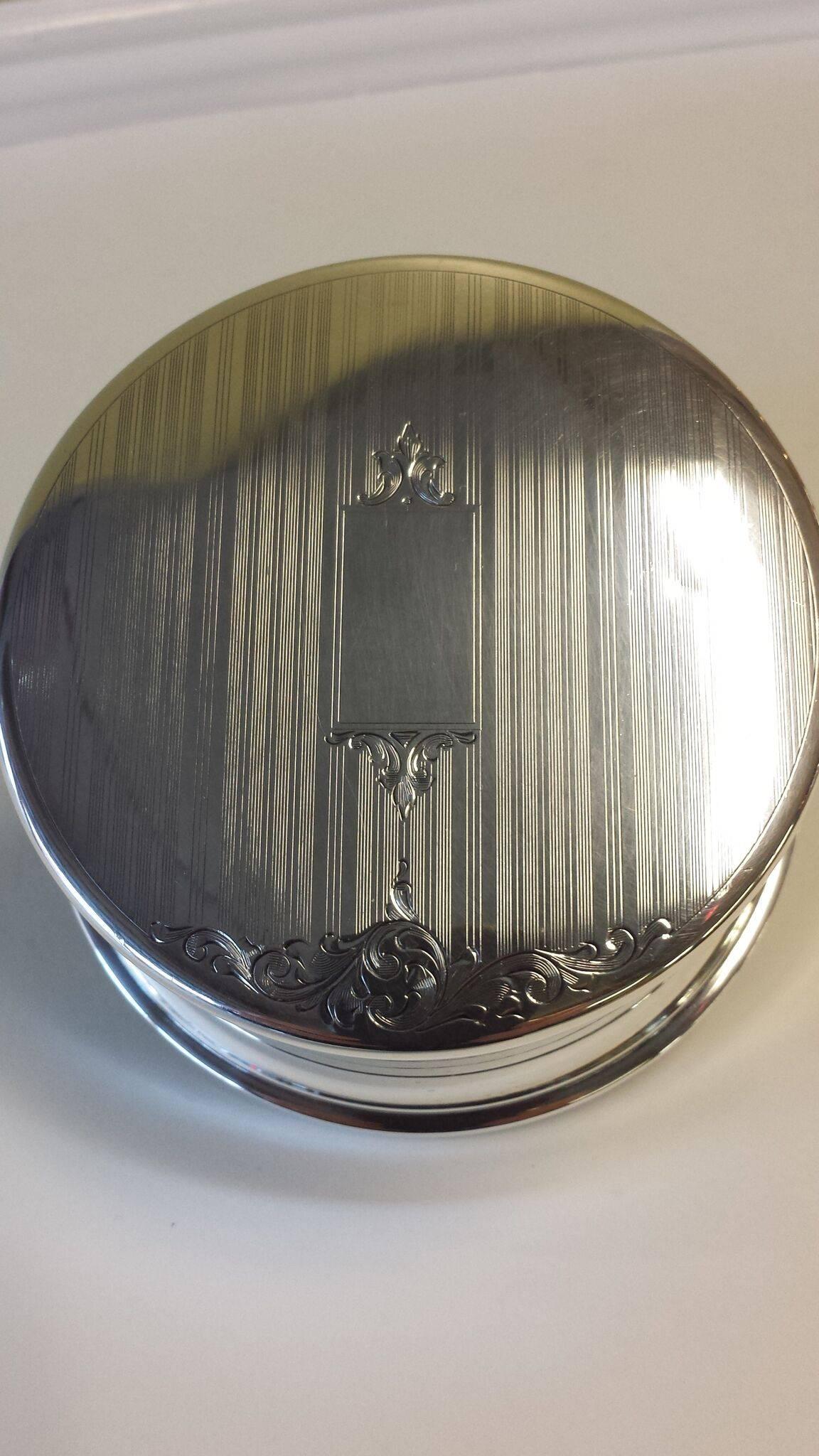 Sterling Silver Round Jewelry Box With Blue Interior & Nicely Decorated Top, The interior is done in a blue velvet, pressure fit lid, and stamped Birks (Maker) Sterling, (Canada's Tiffany). The box measures 4 1/2