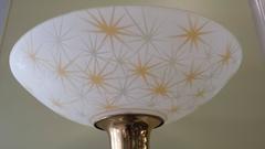 Lampadaire torchère cosmique atomique des années 1960 avec base à motif d'étoile brûlante