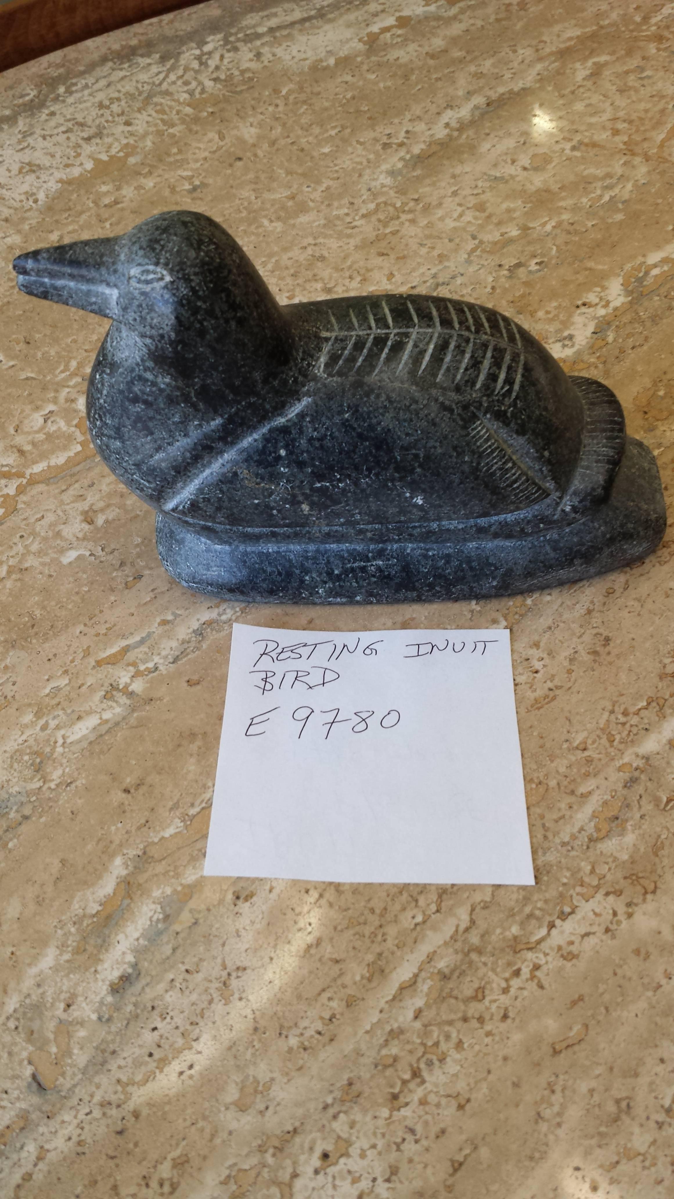 Soapstone Sculpture Carving, Inuit bird at rest, e-numbered for Carver I.D. The bird measures 6 1/2"-inches long x 4 1/4"-inches high x 2 1/2"-inches deep. (Please see pics for marks).