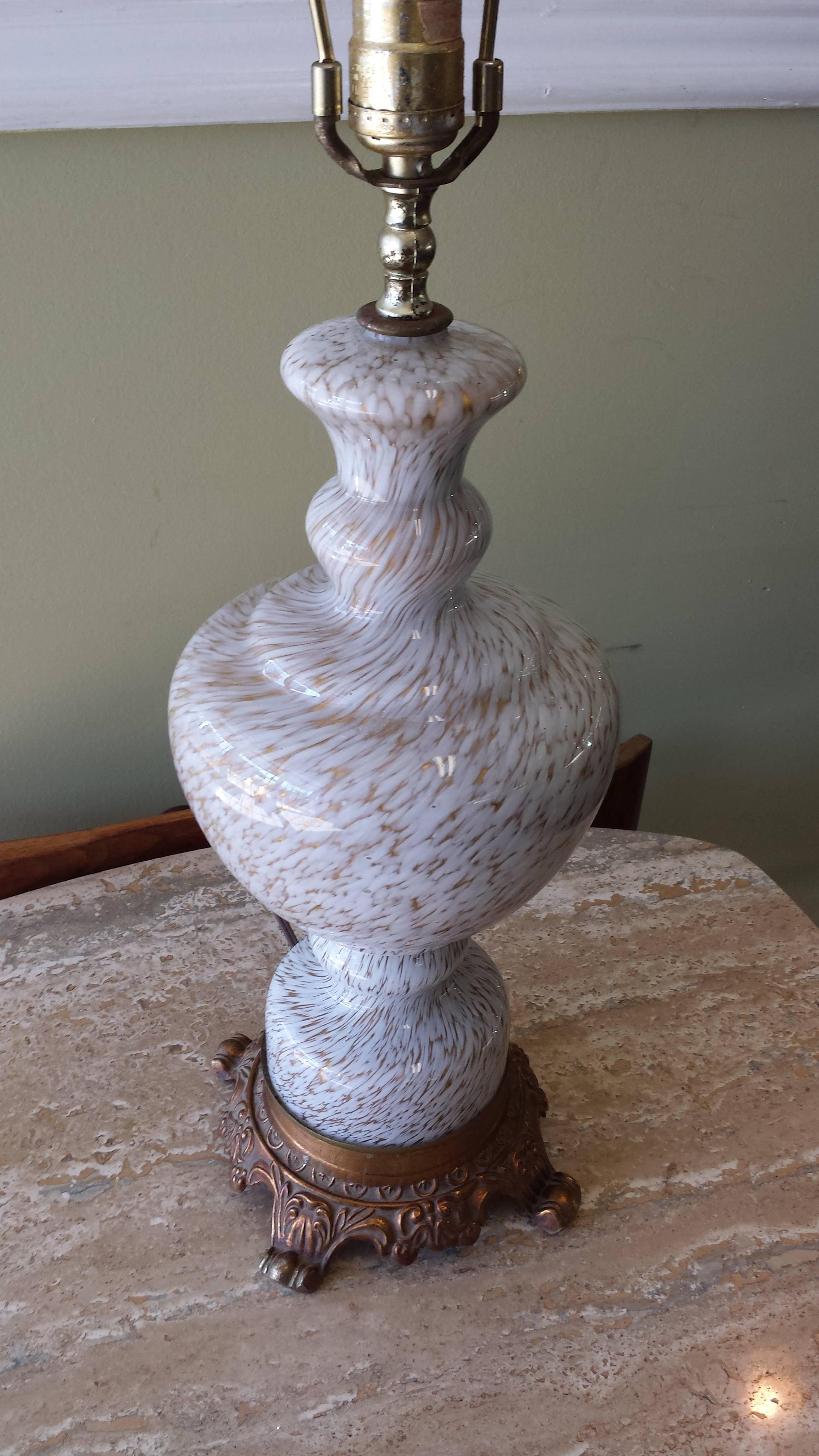 Murano gold and white swirl glass table lamp, in a vase form, and mounted on a metal base. The lamp measures 21" inches to top op socket x 7" inches in diameter, circa 1950's.