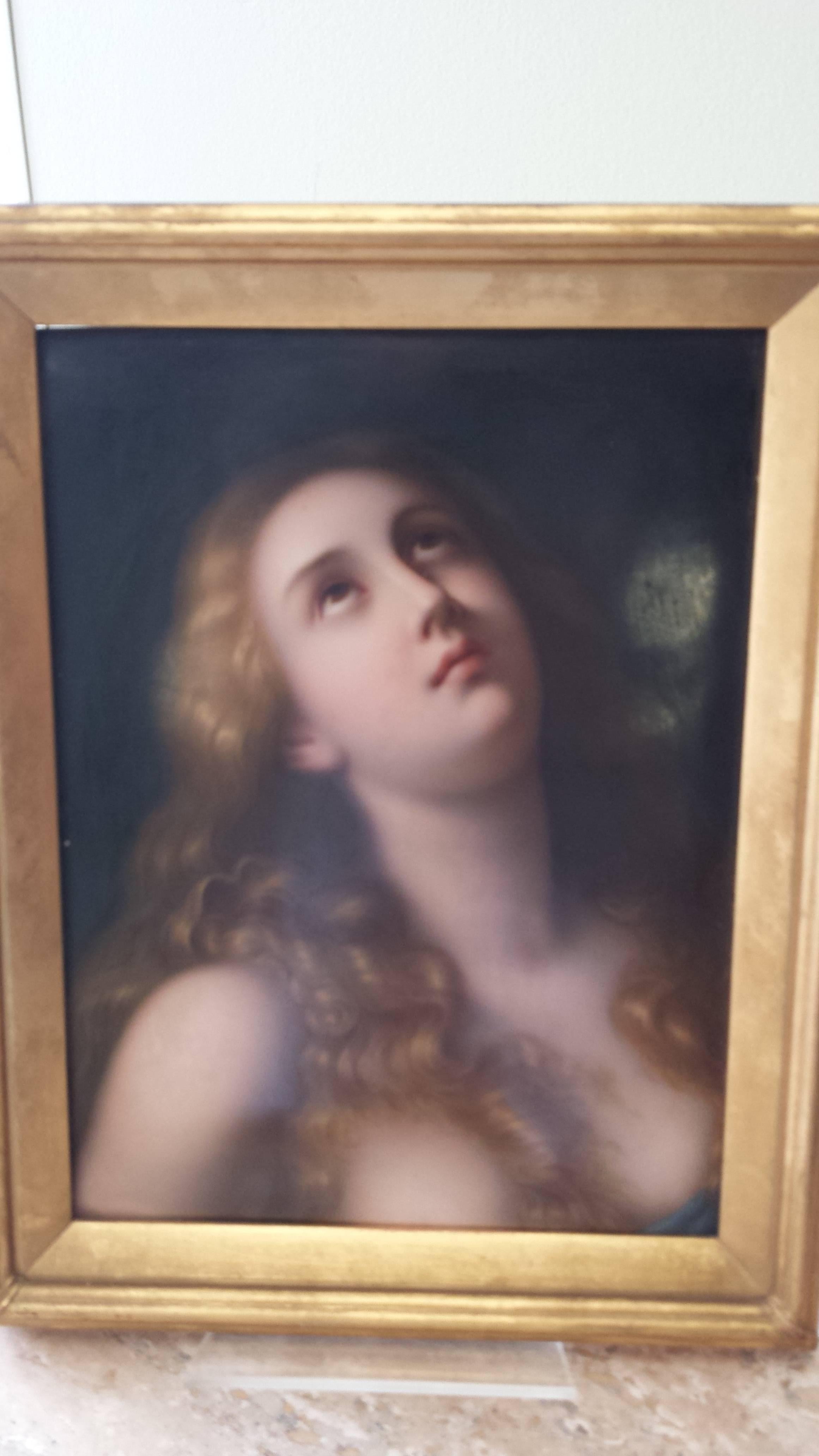 A late 19th century KPM portrait plaque of Mary Magdalene with impressed Scepter Mark and KPM Mark, titled and marked on Verso in pencil, and impressed numbered. Mounted in a period gilt frame measuring 12