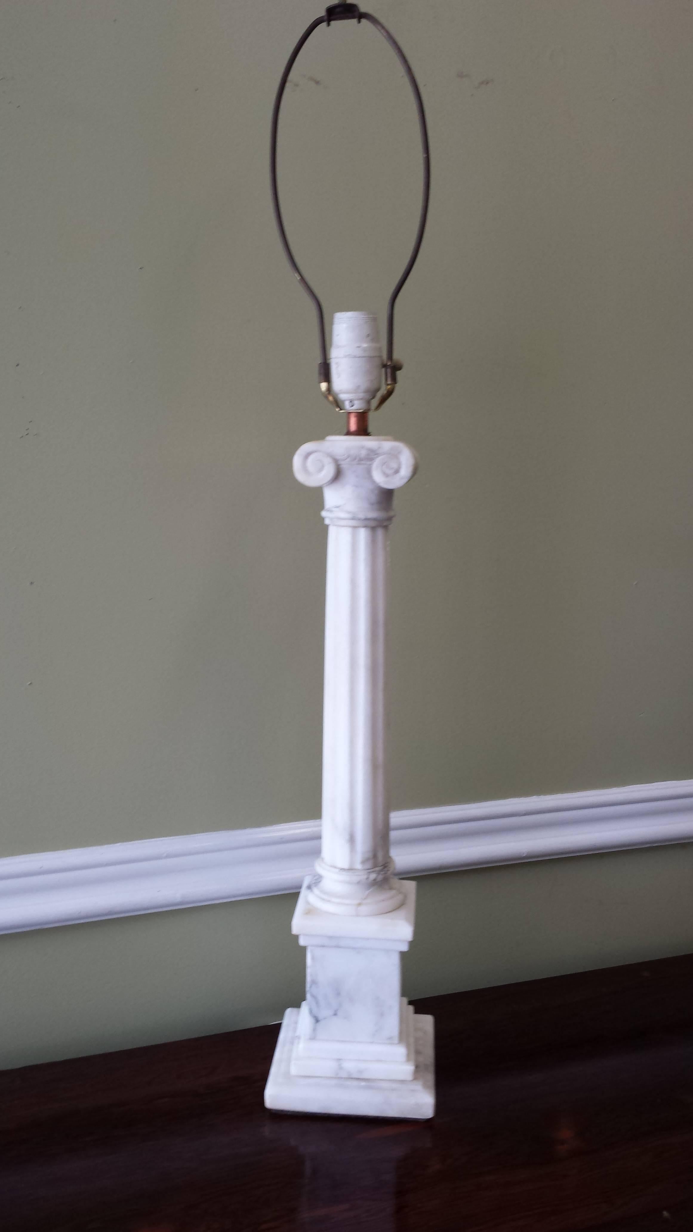 Iconic neoclassical white marble capital column table lamp, circa 1930. Never out of style column lamp measuring 20" inches high x 5" inches x 5" inch square base. The fluted column and scrolled plinth top is nicely detailed as per