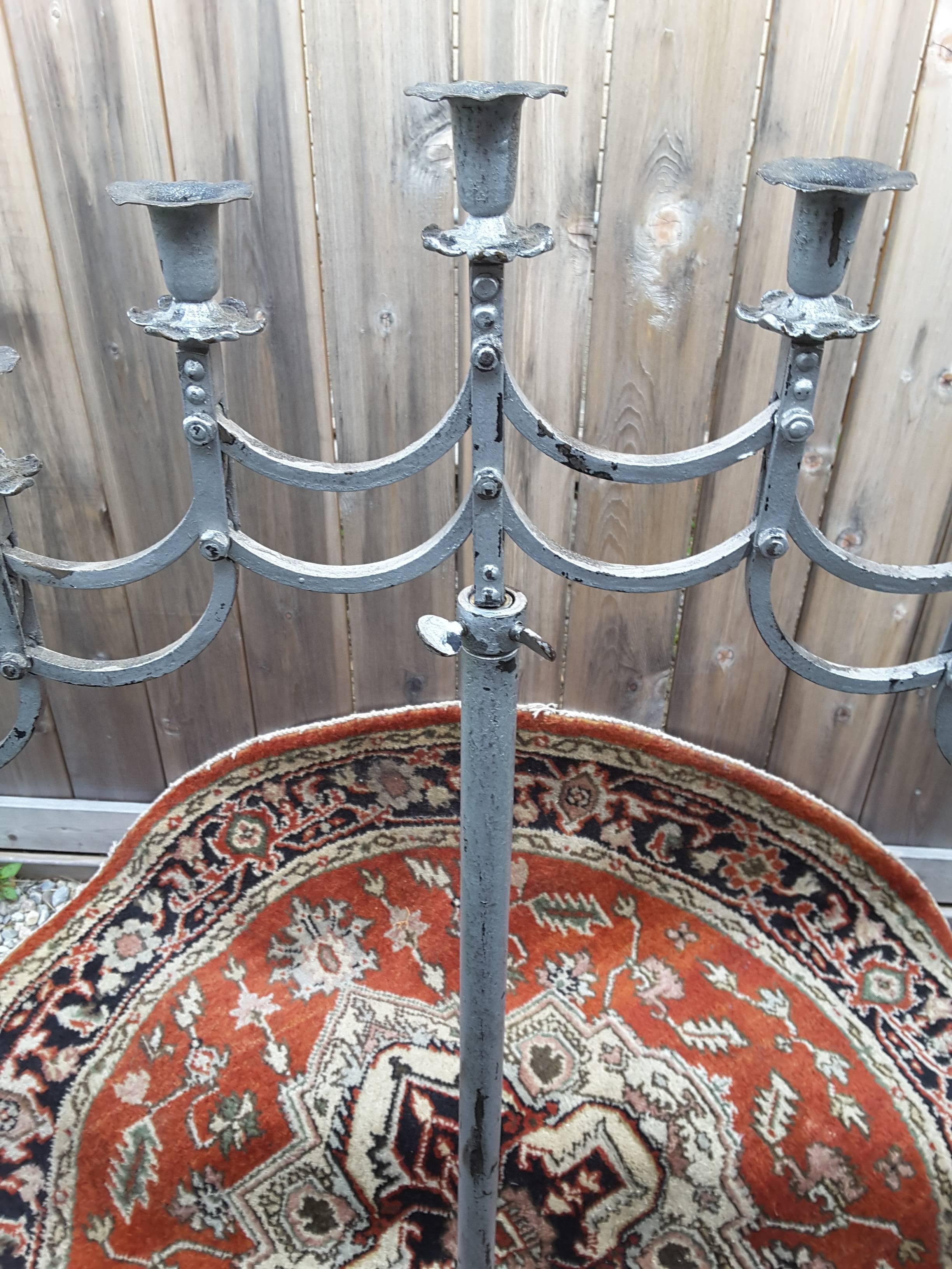 Neoclassical Wrought Iron Candelabra with Adjustable Height and Articulated Seven-Arm Holder