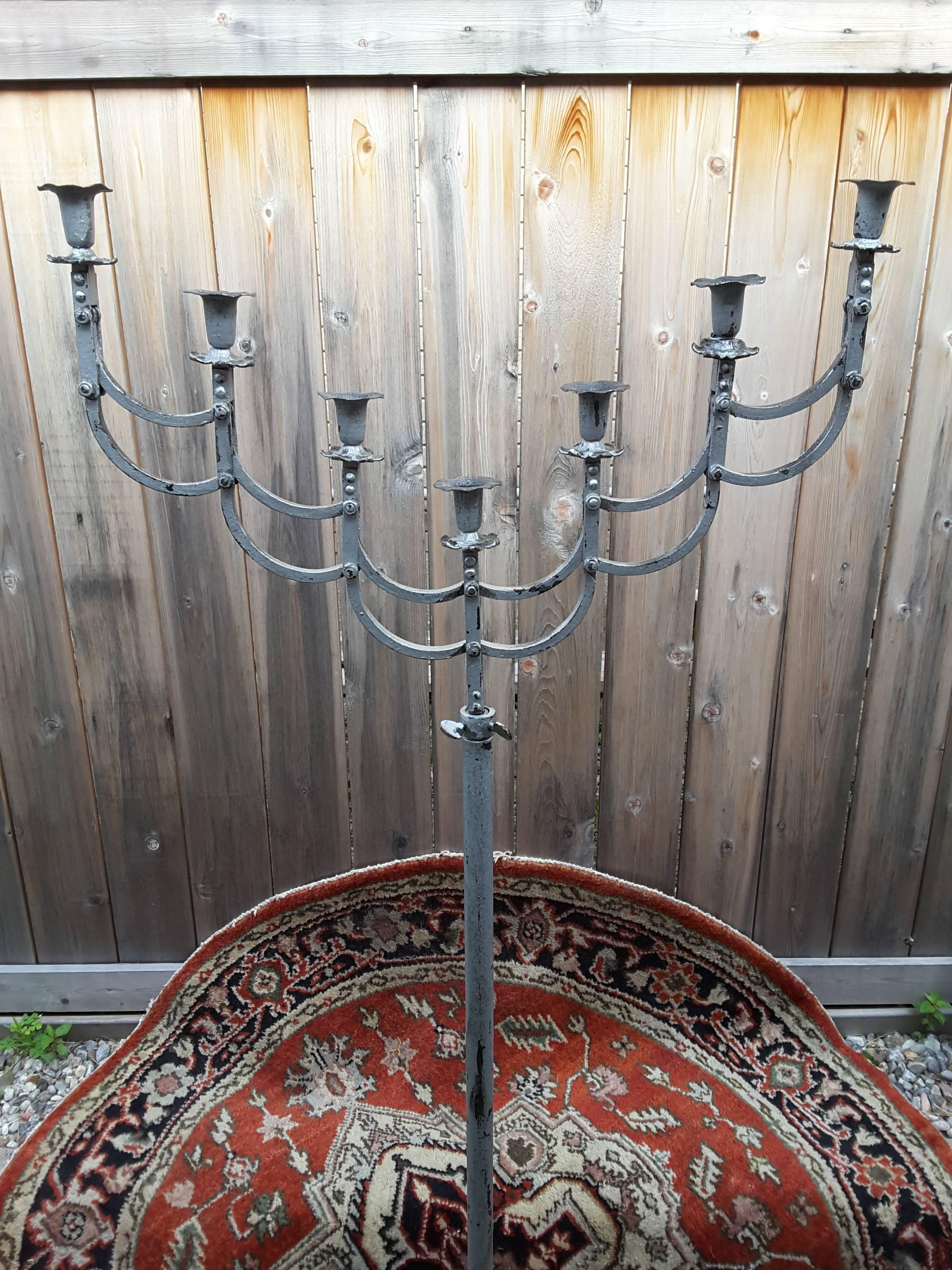 20th Century Wrought Iron Candelabra with Adjustable Height and Articulated Seven-Arm Holder