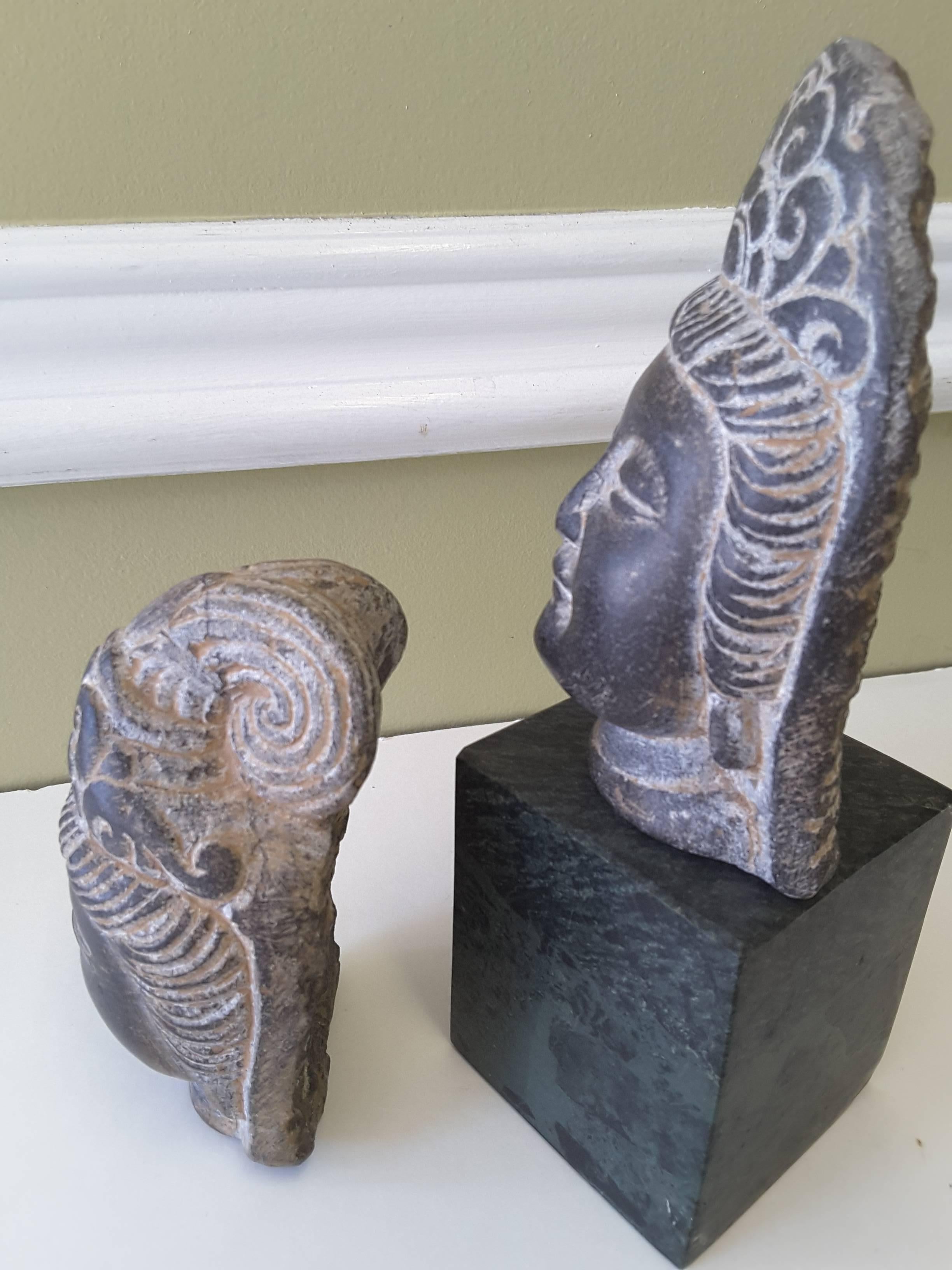 Tribal An Asian Pair of Buddha Stone Heads, Mixed Pair, Unmounted