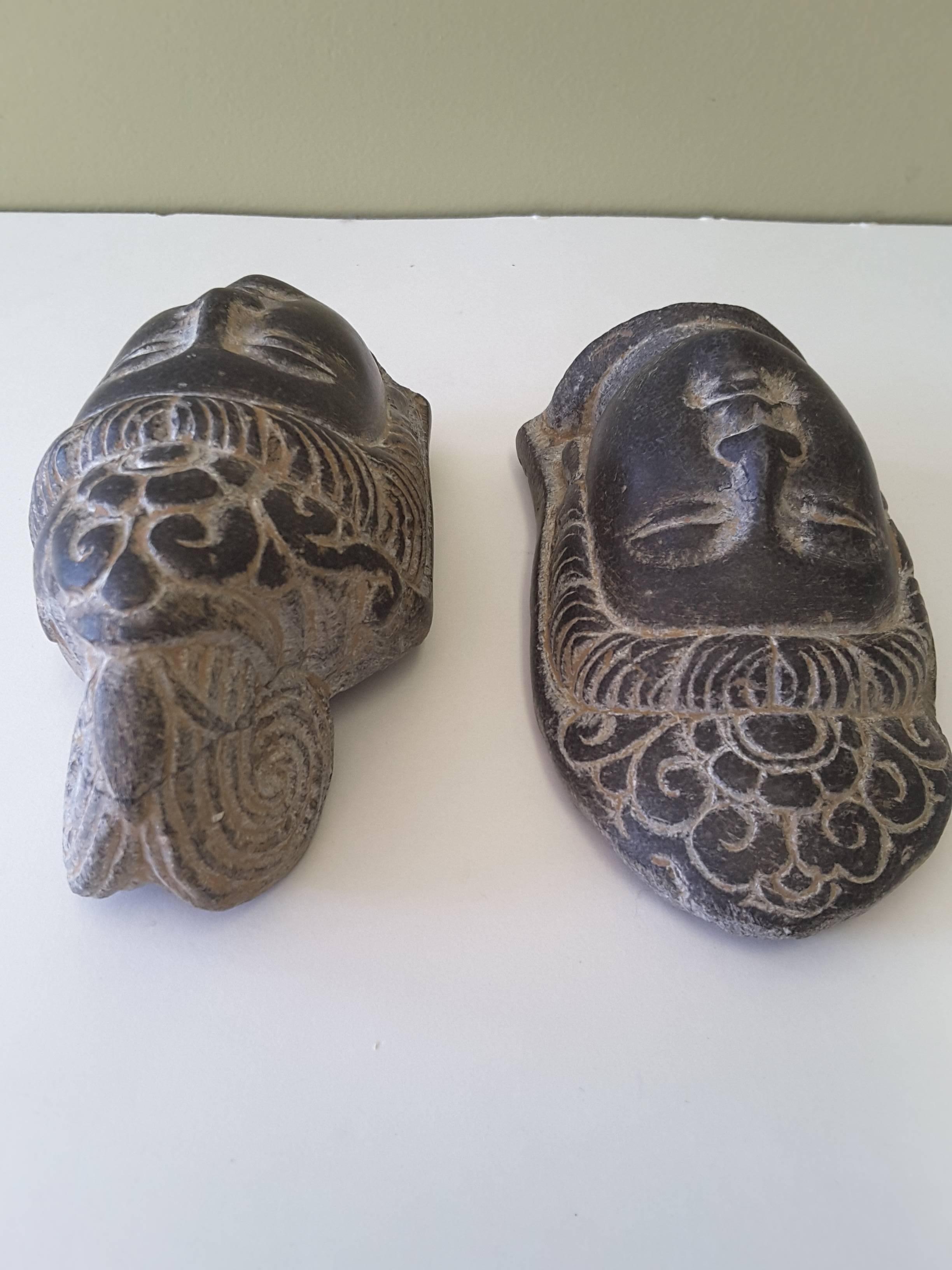 18th Century An Asian Pair of Buddha Stone Heads, Mixed Pair, Unmounted