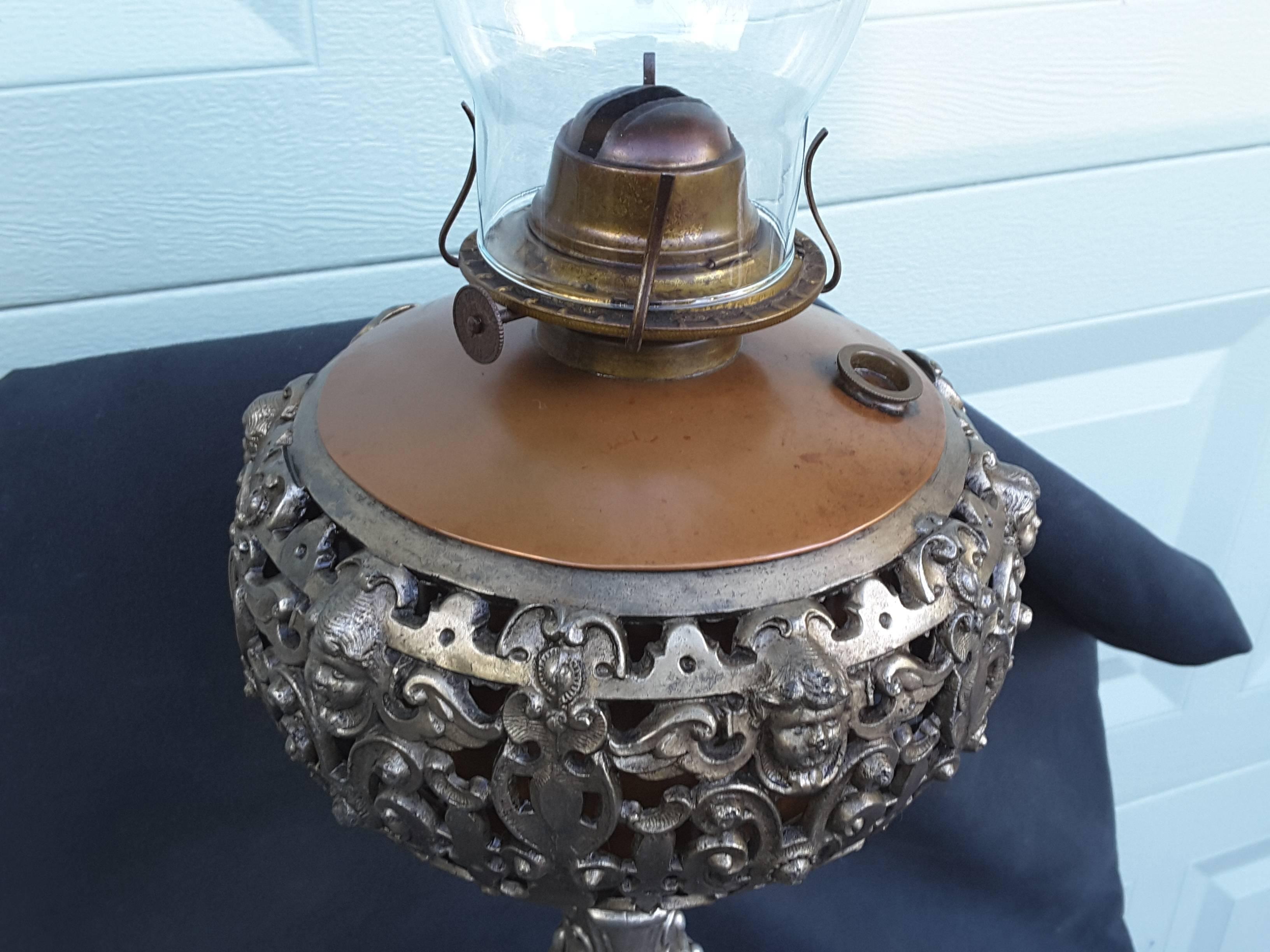 Angel Face Oil Lamp Silver Tone Finish Scrolled Foot & Acanthus Leaf Decoration In Good Condition In Ottawa, Ontario
