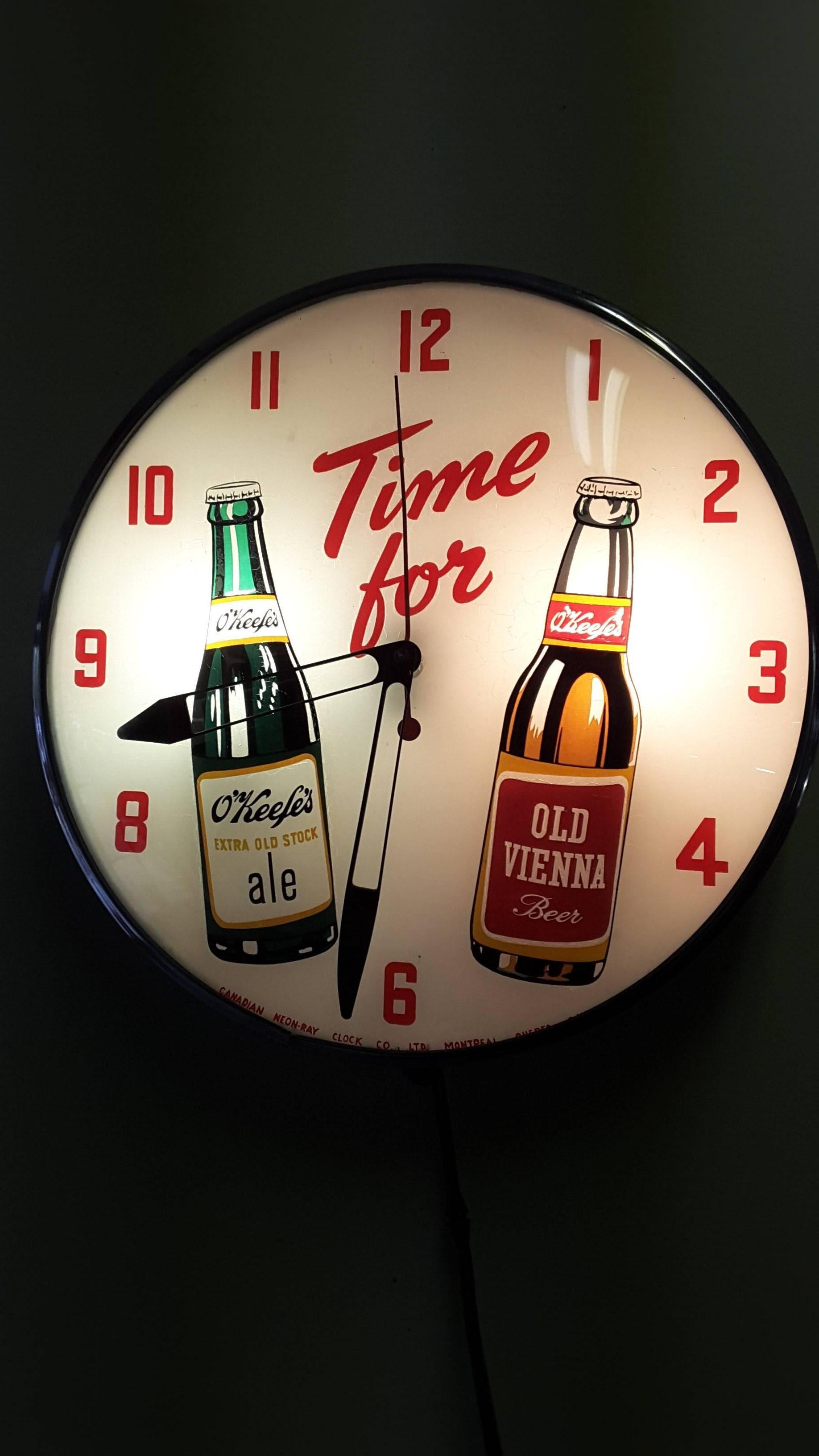 O'keefe's advertising clock, back lit by Canadian Neon-Ray clock Co. Ltd. Montreal, Quebec, canada. The ad says Time for O'keefe's extra old stock Ale & O'keefe's Old Vienna Beer, The clock is working and keeps good time, the face is reverse painted