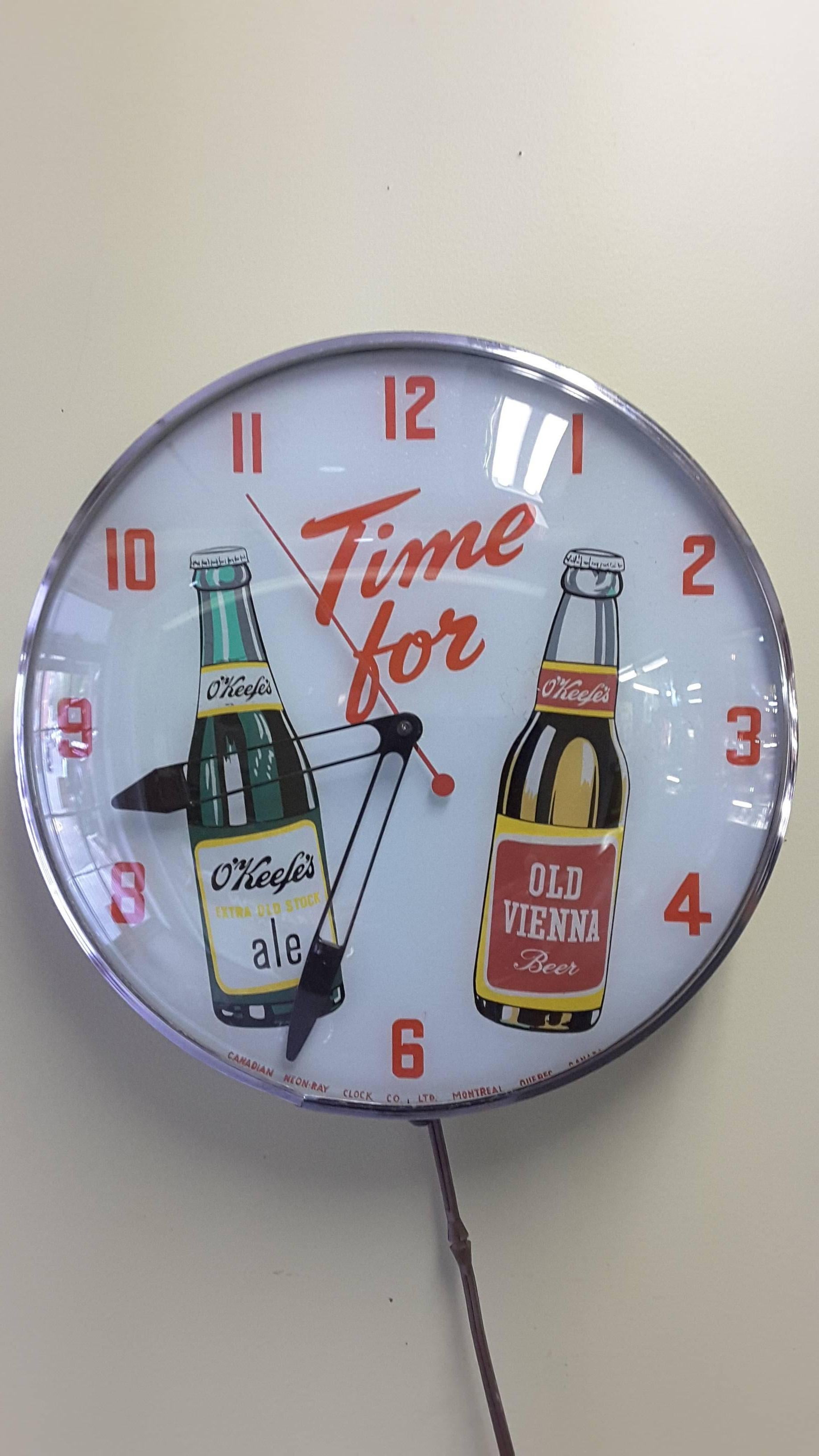 Glass O'keefe's Advertising Clock, Back Lit by Neon-Ray Clock Co.