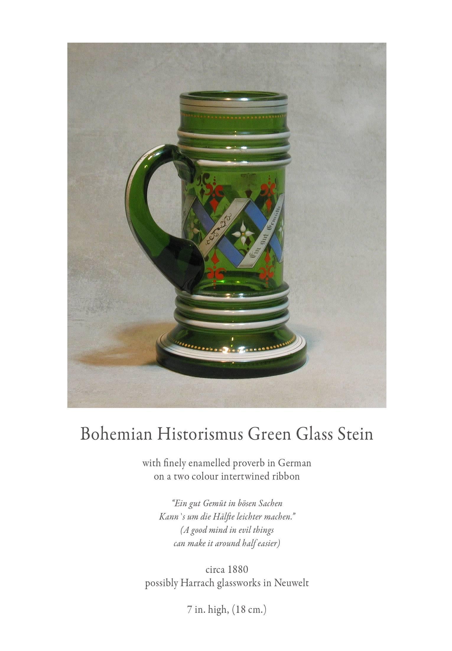 Bohemian Historismus green glass stein with finely enameled proverb in German on a two colored intertwined ribbon. 
Saying and translation.
 