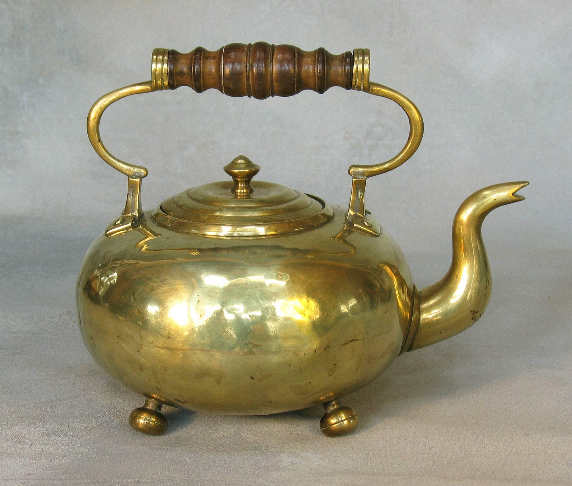 white and brass kettle