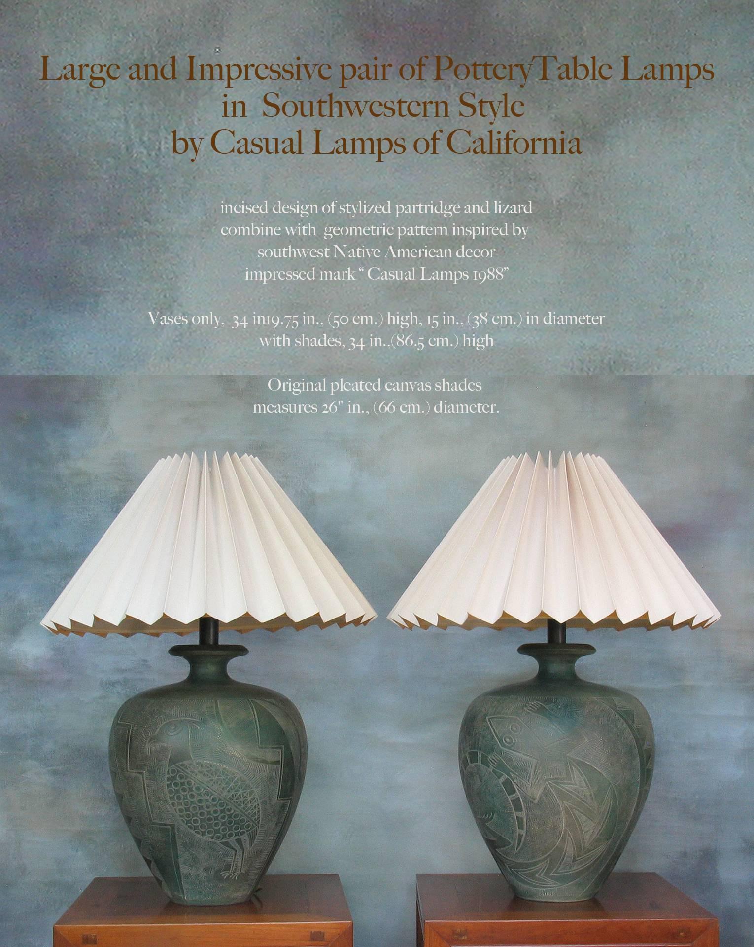 Large and Impressive Pair of Southwestern Table Lamps by Casual Lamps of California, Incised design of stylized partridge and lizard combined with geometric pattern inspired by Southwest Native American decor, impressed mark "Casual Lamps