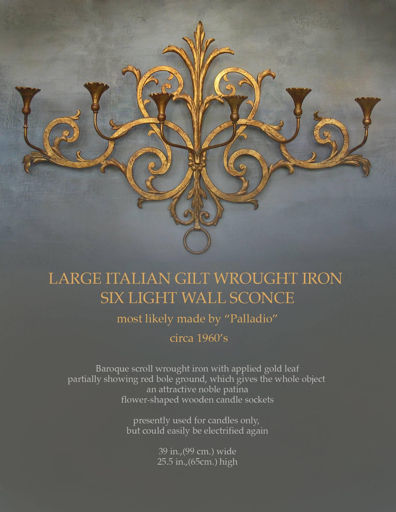 A large Italian gilt wrought iron six-light wall candle sconce, most likely made by 