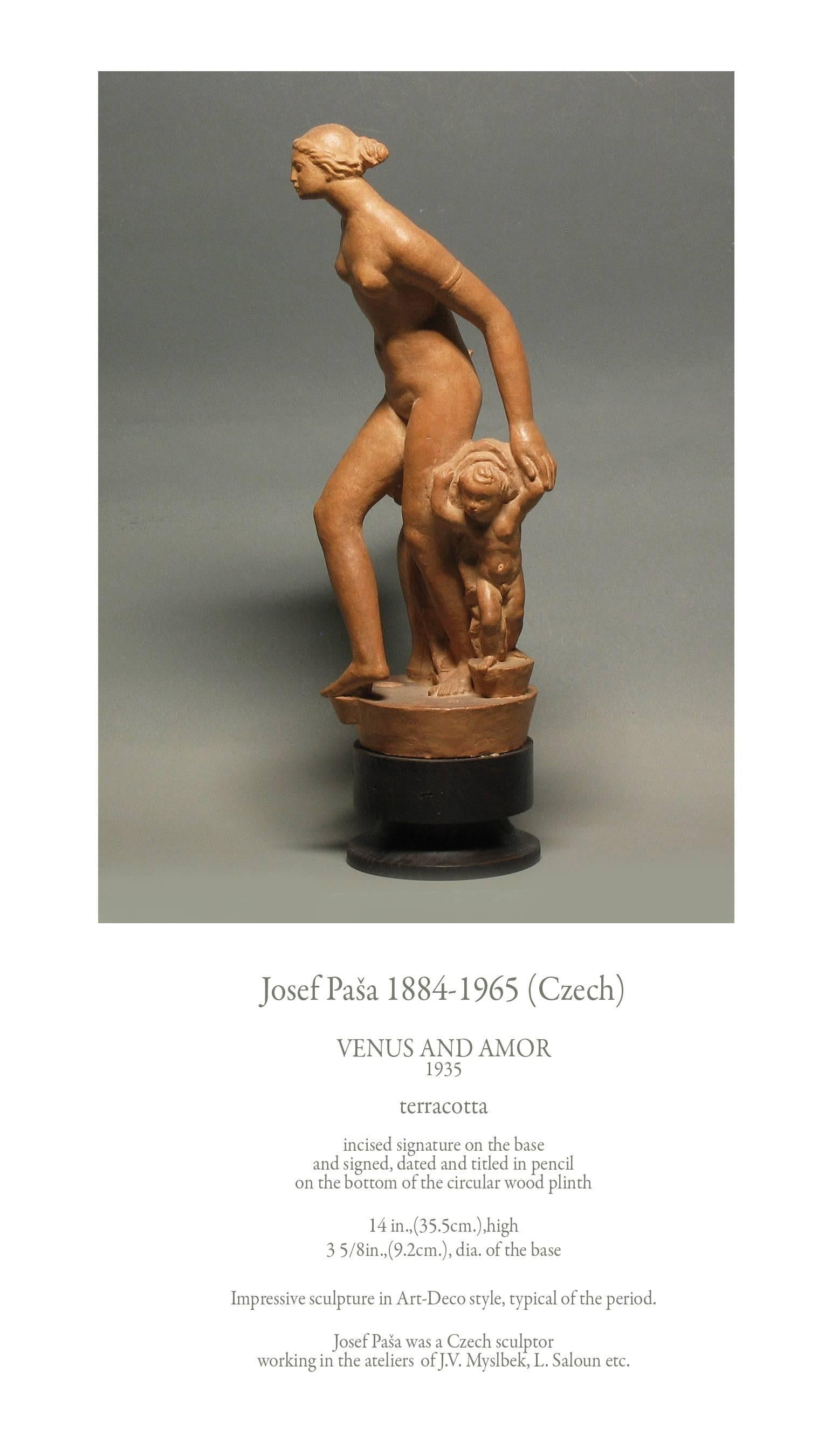 Josef Pasa 1884-1965 (Czech), Titled Venus and Amor 1935, Made of terracotta, Incised signature on the base and signed, dated and titled in pencil on the bottom of the circular wood plinth. The sculpture measures 14"-inches high x 3