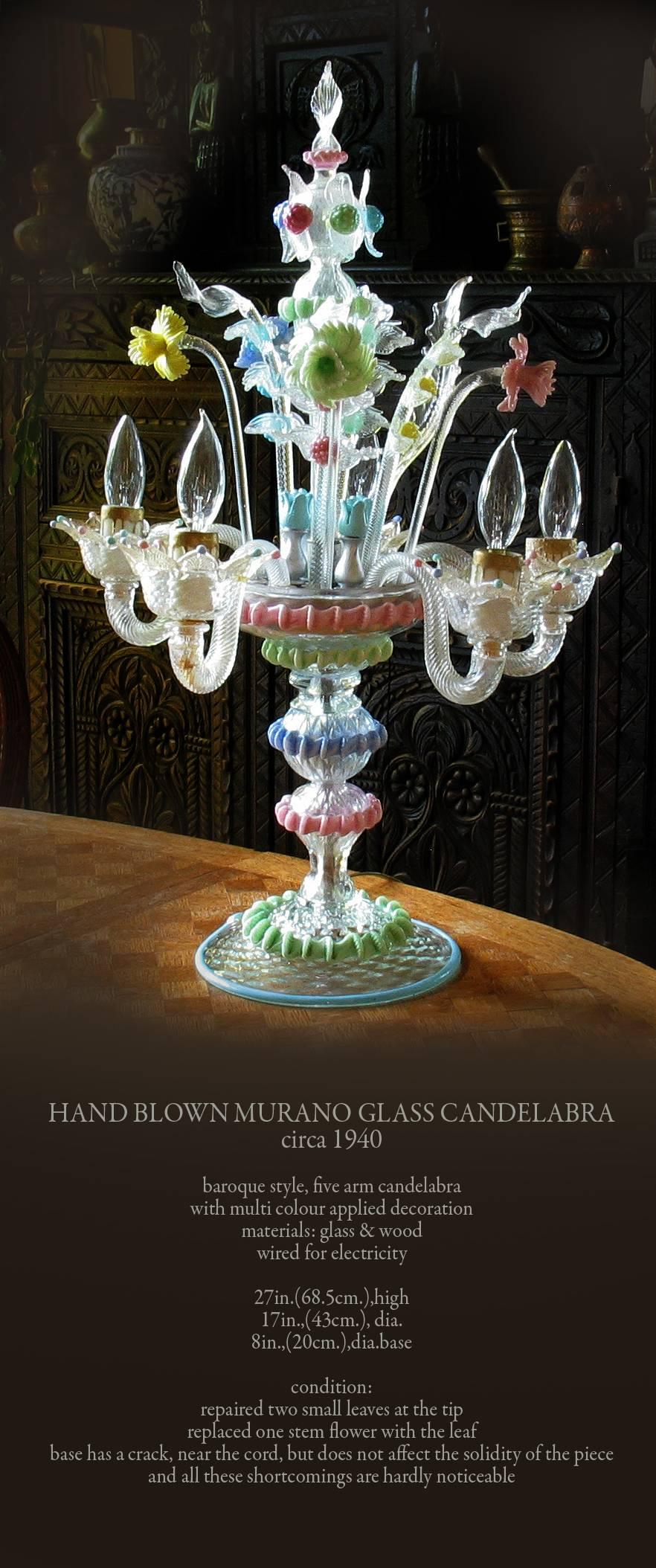 Handblown Murano glass candelabra, multicolored, circa 1940, Baroque style, five-arm candelabra with multicolored applied decoration, materials: glass and wood, wired for electricity, The candelabra measures 27