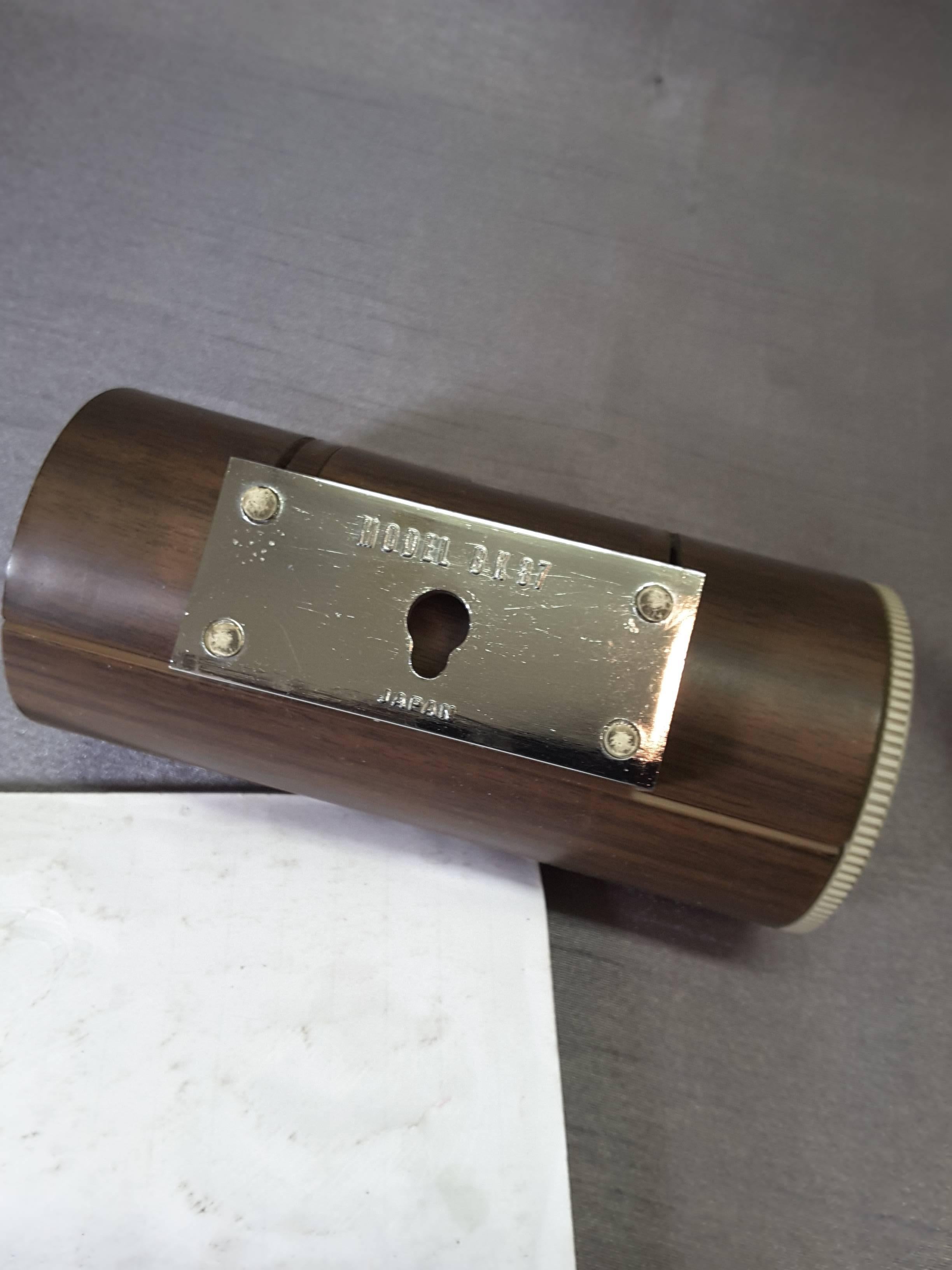 Mid-Century Modern 1967 Wood Grain Finish Tubular Solid State Am Radio 2