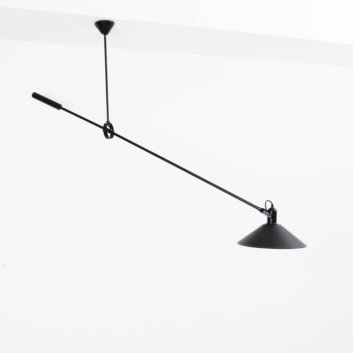A sculptural counterbalanced ceiling lamp by one of the most respected Dutch lighting designers of the era, JJM Hoogervorst, principle designer for ANVIA, Holland. The weighted arm holds the position of the lamp. It is in excellent condition with