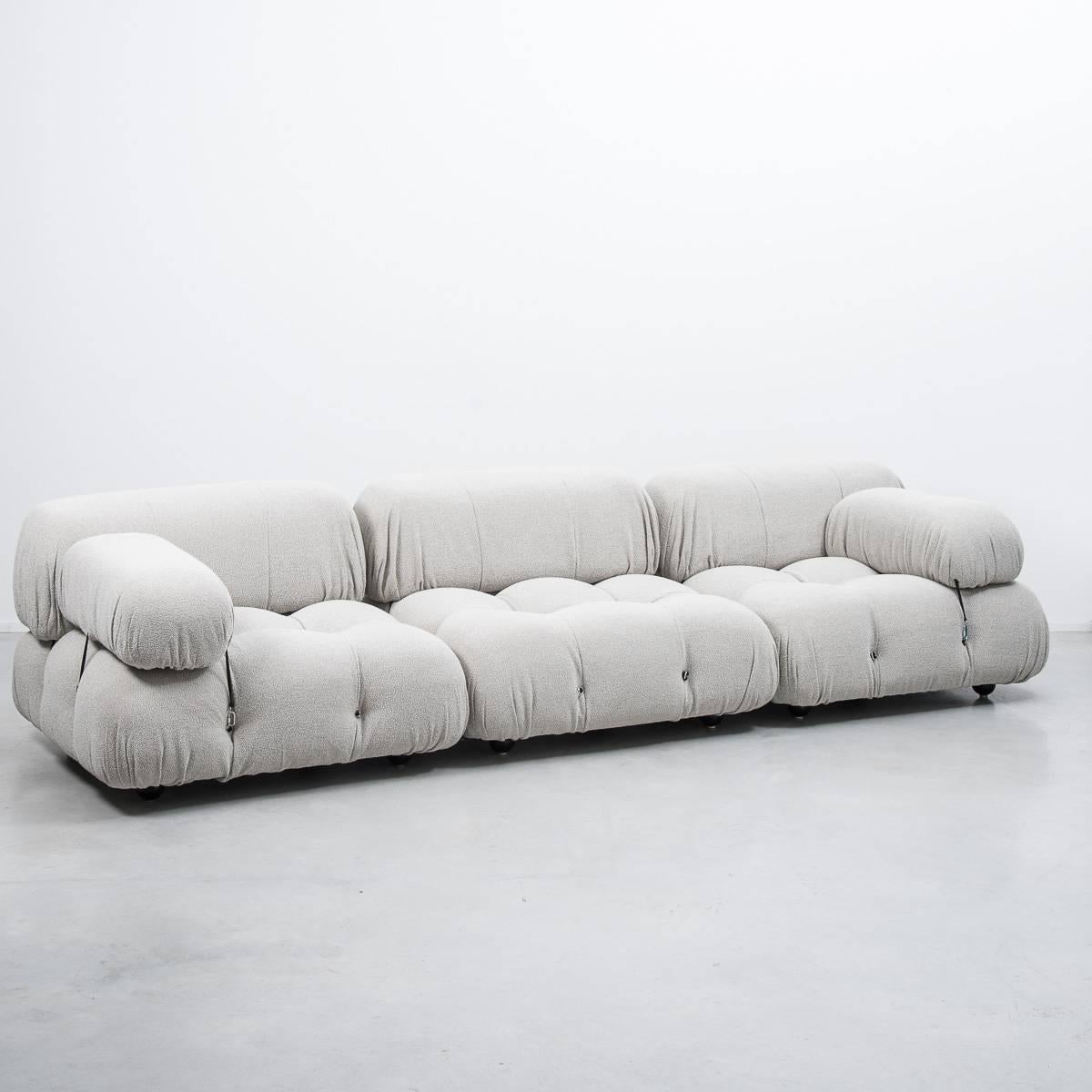 This three-seat modular sofa was designed by Mario Bellini in 1971 and was manufactured first by C&B and later by B&B Italia. The backs and armrests are provided with rings and carabiners, which allows the user to create the desired