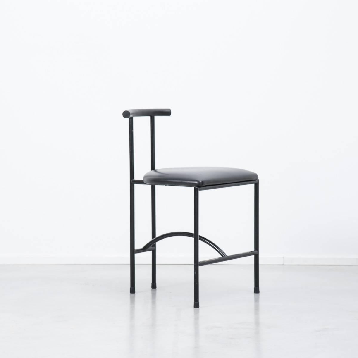 A Tokyo chair designed by Rodney Kinsman for Italian manufacturer, Bieffeplast. Chrome tubular frames with black rubber backrests and black semi leather seats.