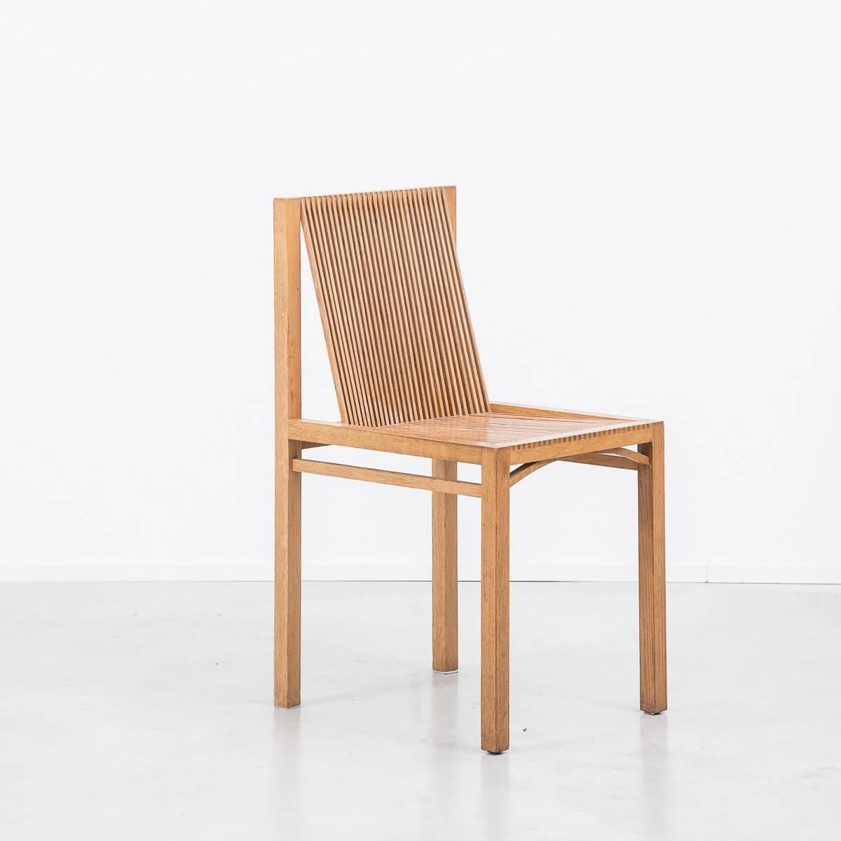 These expertly crafted Latjes chair were designed by Dutch designer Ruud Jan Kokke. His working style is associated with that of traditions set by Gerrit Rietveld in that he heavily prototypes each design in his workshop. Kokke has designed for
