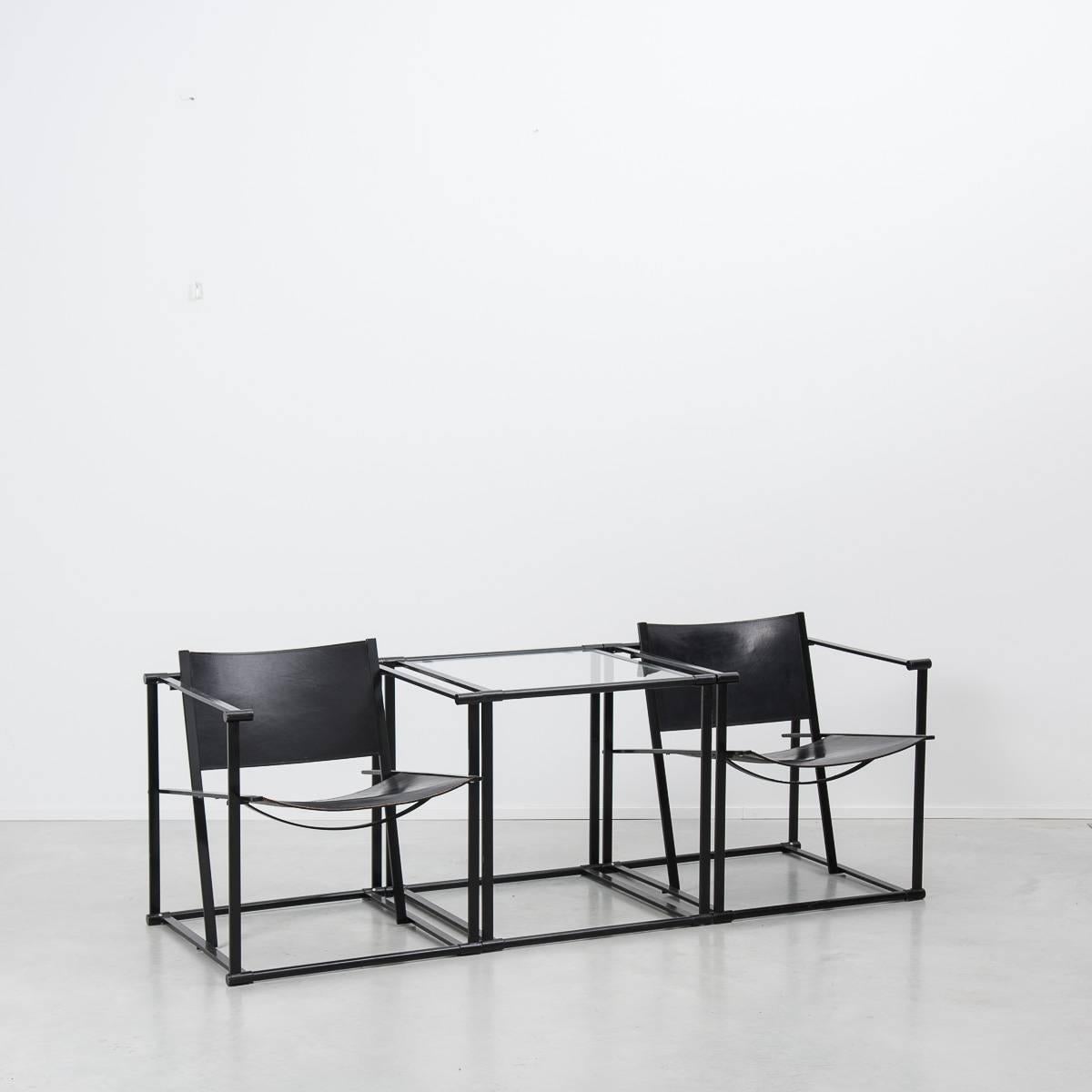 Radboud Van Beekum FM62 chairs and TM61 table,
Pastoe, Netherlands, 1984.

A geometric chair set designed by Radboud Van Beekum, constructed from folded steel with leather seating. Following in the tradition of the De Stijl movement the chairs