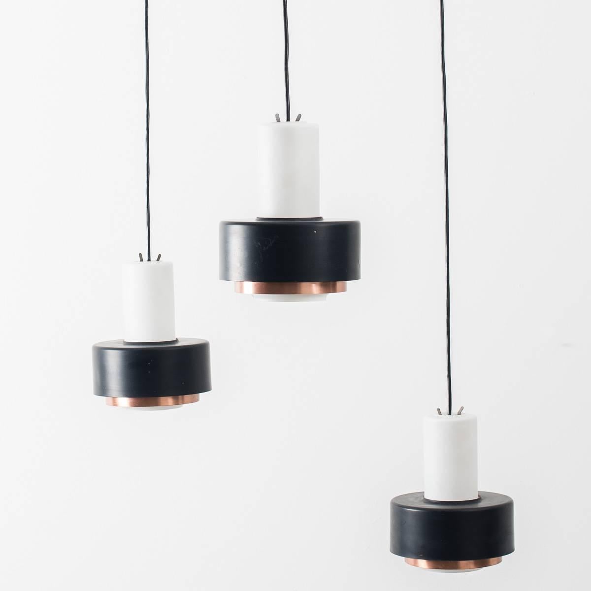 Mid-20th Century Set of 4 Copper and Milk Glass Modernist Pendants