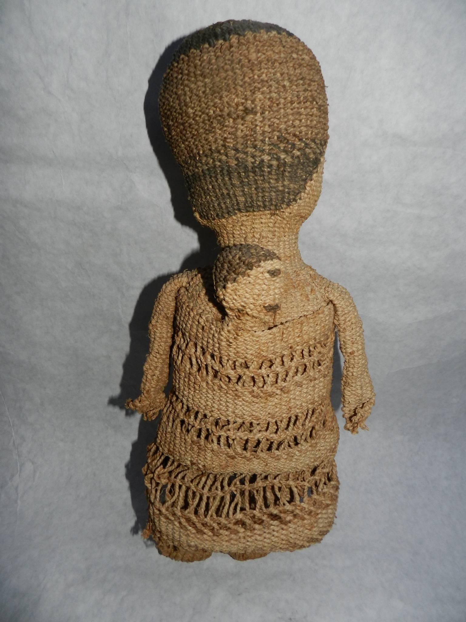This antique Native American basketry female doll with child is from the Oregon coast area. It came from a Beverly Hills, Ca collection.