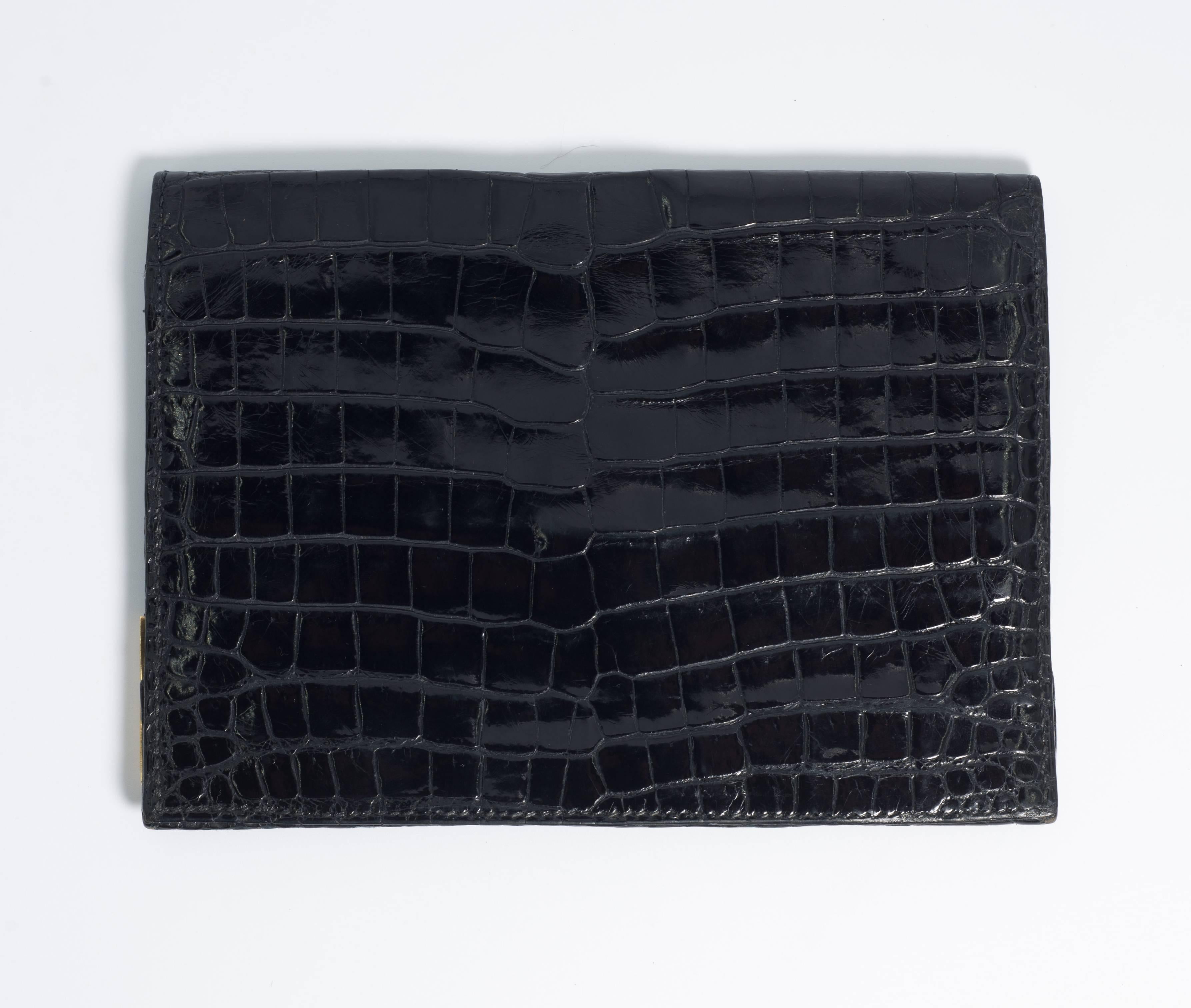 Superb Hermes Paris 1960s gentleman's black African crocodile gold cornered wallet
fully lined in matching crocodile. Opens up end to end through the tab. Pockets for cards etc. Stamped Hermes Paris
Provenance of a Gentleman
Measures 6 x 4 and