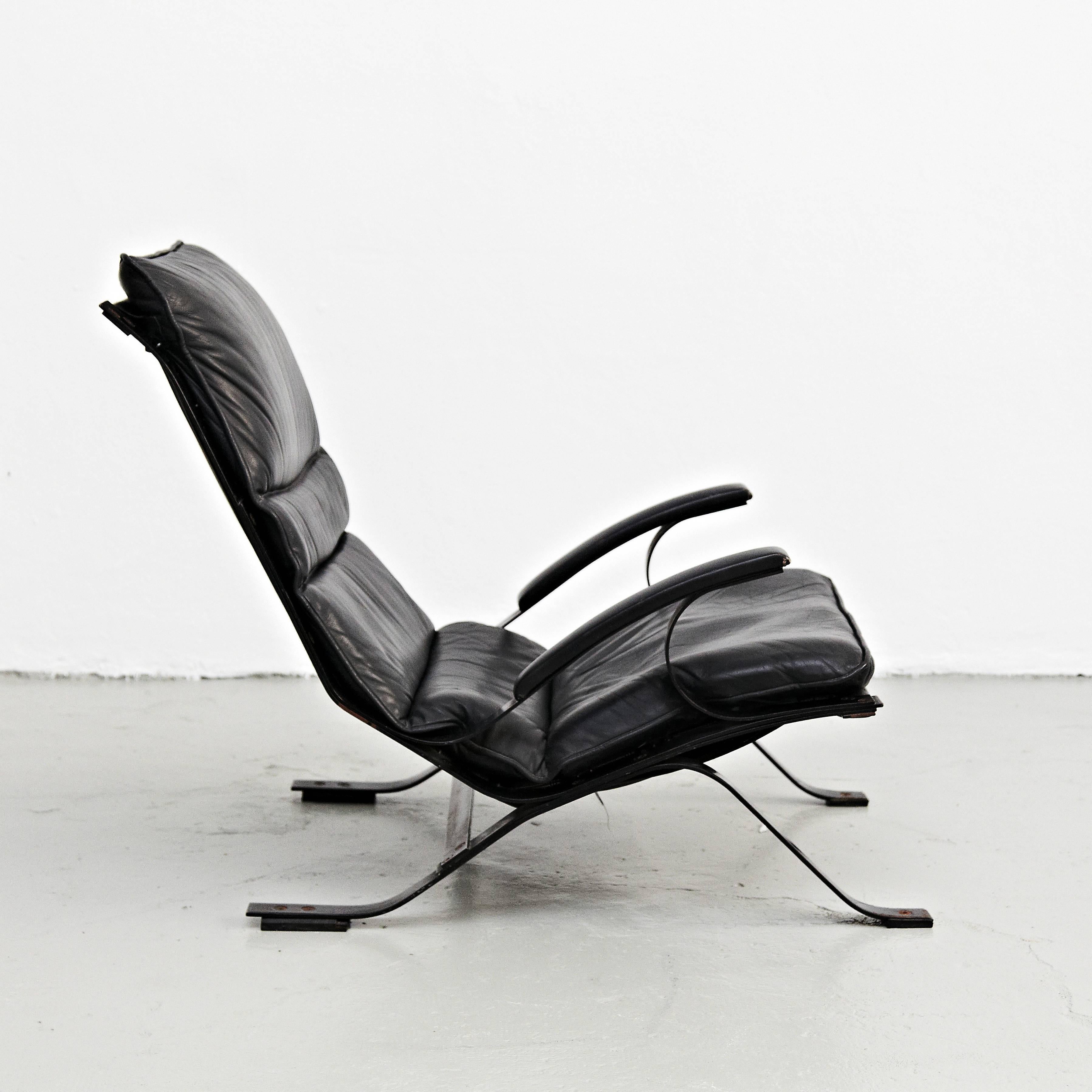 Lounge chair designed by Pep Bonet for Levesta manufactured in Spain, 1969.

Lacquered plated steel frame and original black leatherette.

In good original condition, with minor wear consistent with age and use, preserving a beautiful