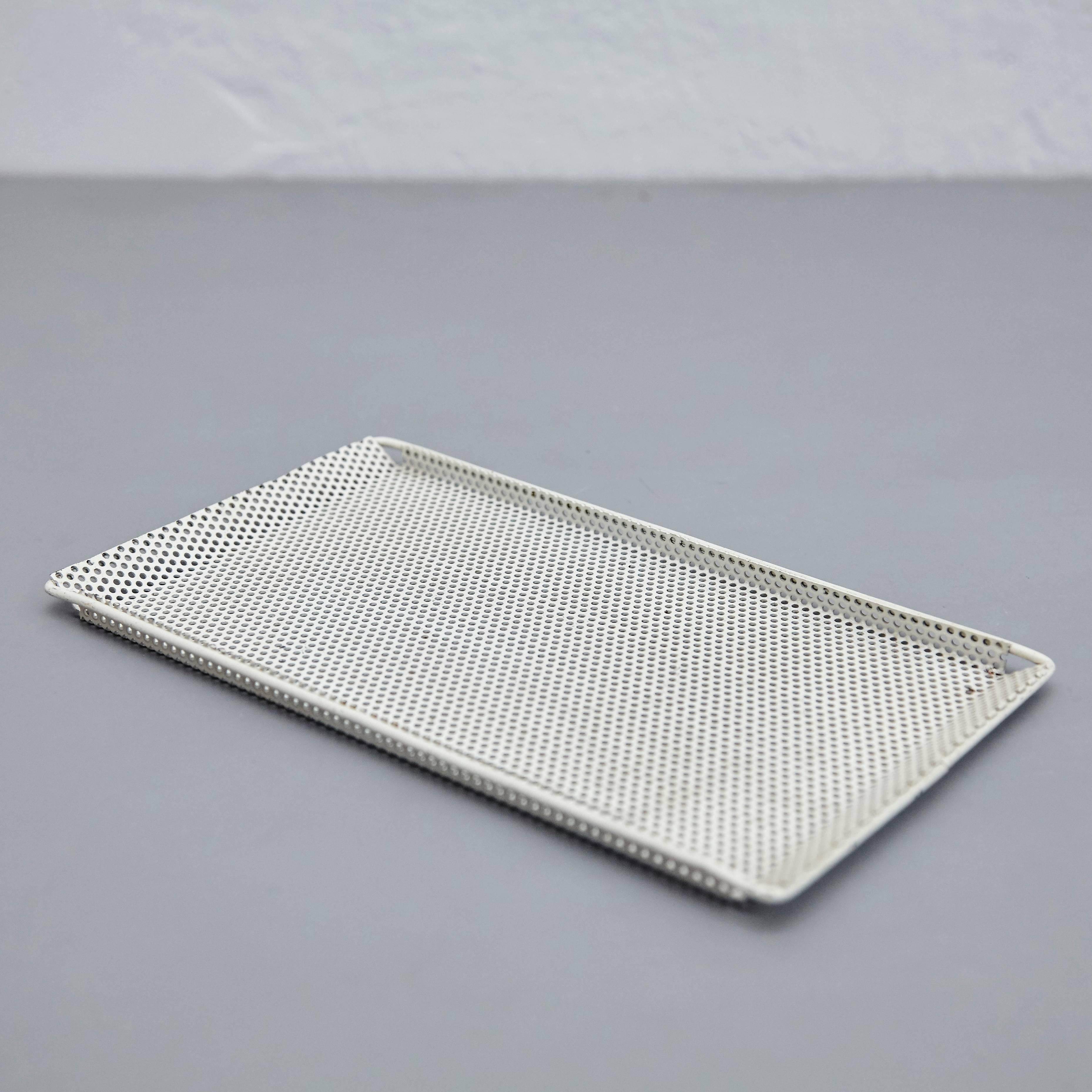 Enameled metal plate designed by Mathieu Matégot.
Manufactured by Artimeta (Holland), circa 1950.
Lacquered perforated metal with original paint.

In great original condition, with minor wear consistent with age and use, preserving a beautiful