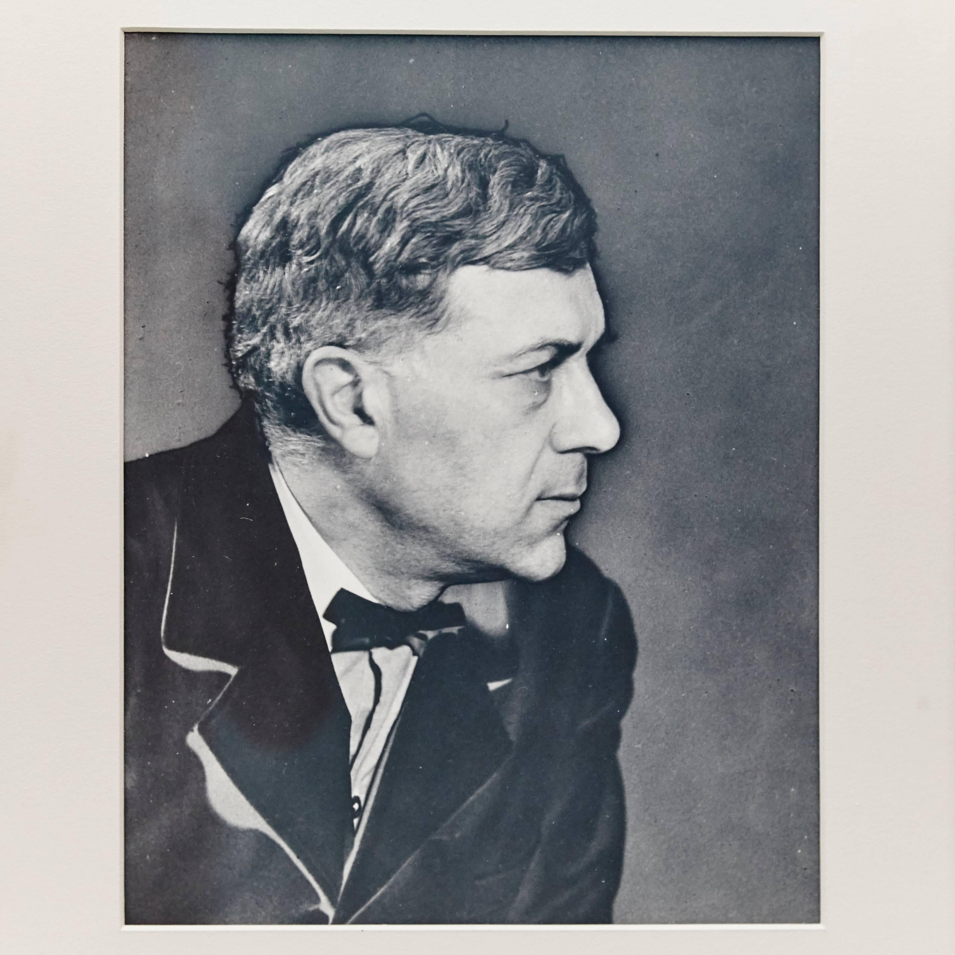 Man Ray Photograph of Georges Braque, 1930.

A posthumous print from the original negative in 1977 by Pierre Gassmann.

Gelatin silver bromide, framed on a 19th century frame with museum glass.

(Man Ray 1890–1976) was an American visual