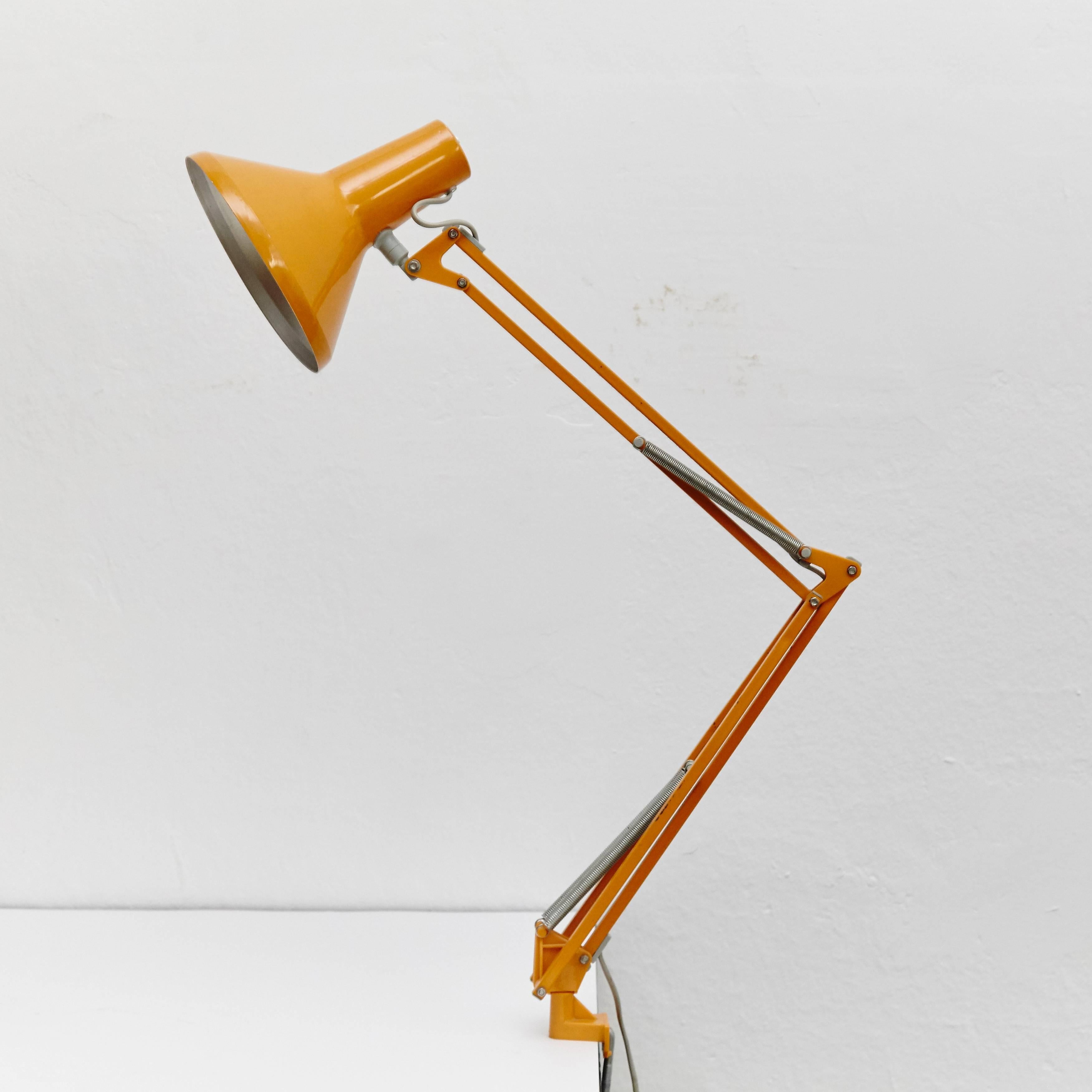 Danish Industrial Anglepoise lamp was produced by HCF in the 1960s.

In good original condition, with minor wear consistent with age and use, preserving a beautiful patina.