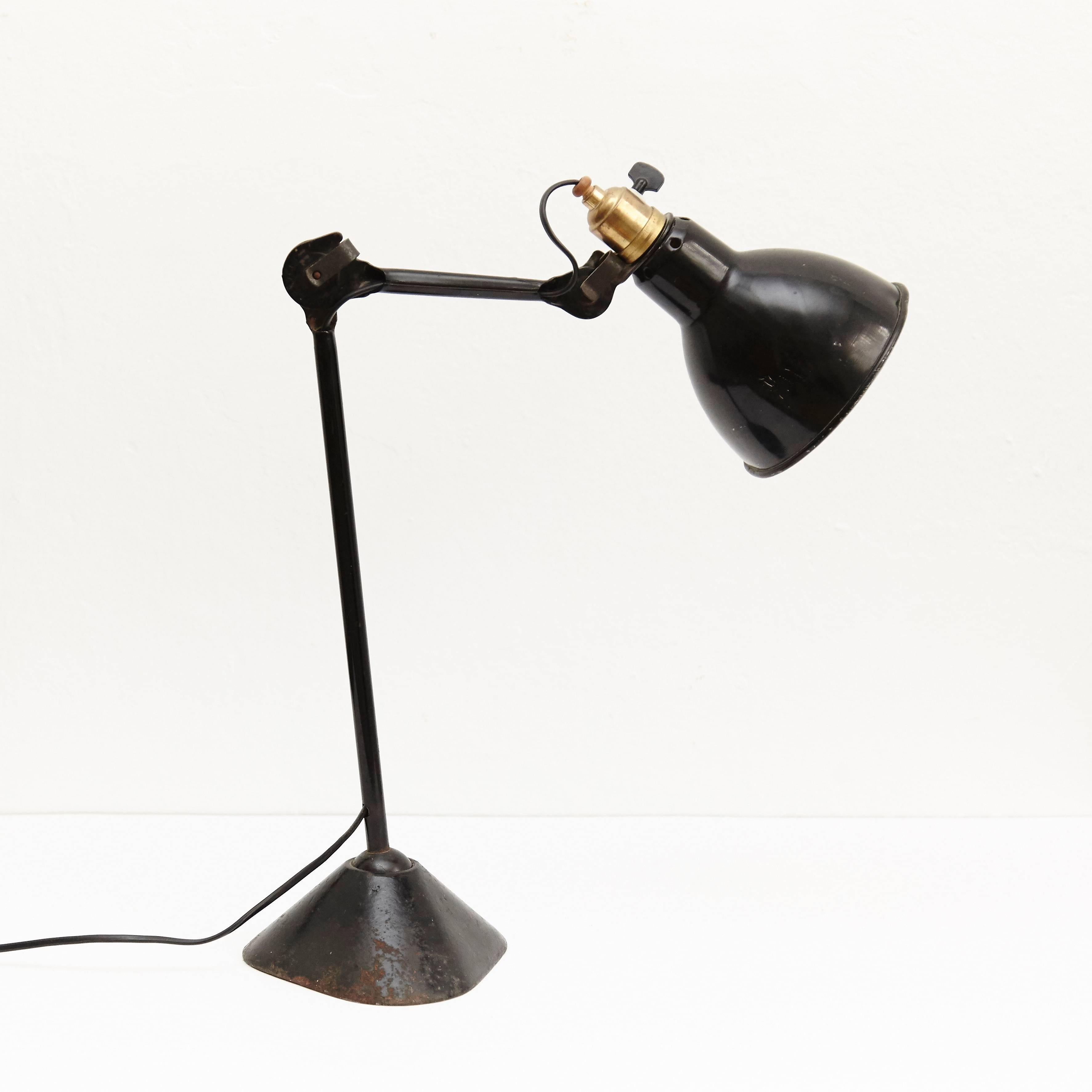 Table lamp designed by Bernard-Albin Gras.
Manufactured by Gras (France) circa 1930.
Aluminium and steel.

In good original condition, with minor wear consistent with age and use, preserving a beautiful patina.

In 1922 Bernard-Albin Gras