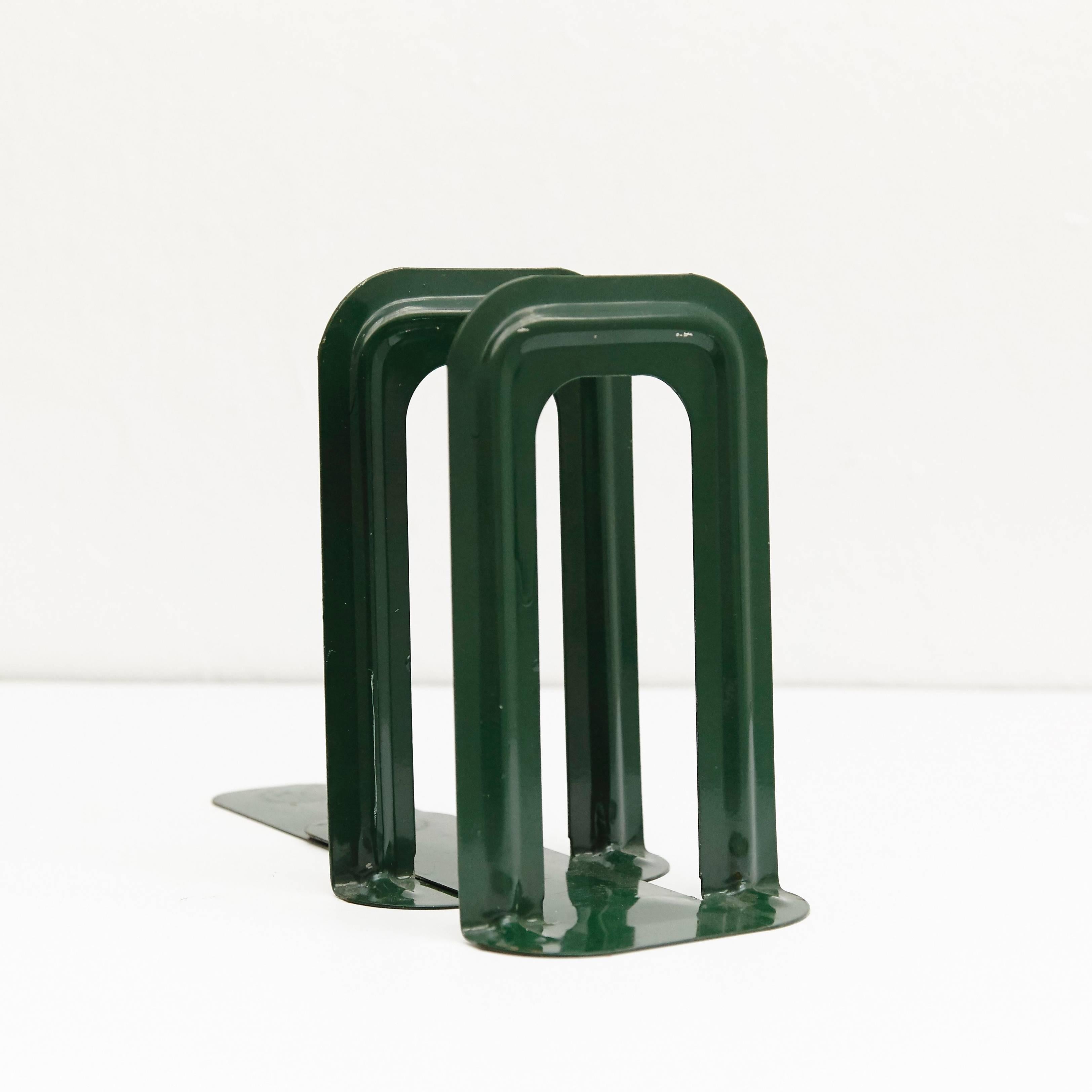 Bookend designed by Bernard-Albin Gras.
Manufactured by Gras (France), circa 1905.
Lacquered metal. Bottle green and grey.

GRAS RAVEL metal stamping. 

This set is shown and referenced on page 37 in the book 'lampe GRAS didier