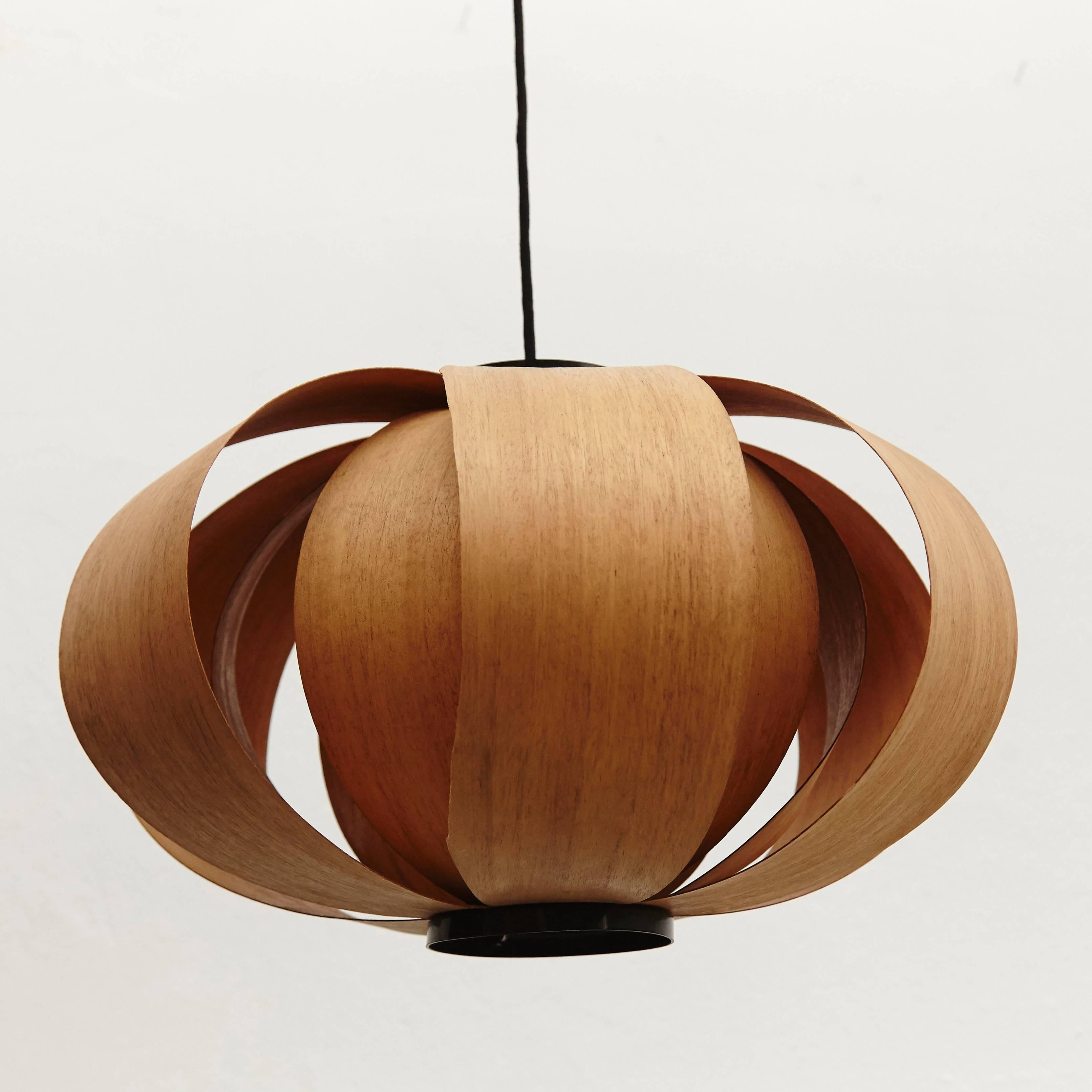 Disa lamp or coderch lamp, designed by Jose Antonio Coderch in 1957, manufactured in Spain, circa 1950.
It's composed by two sheets of betwood in two diferent layers size. 
Aluminium structure and bentwood as lampshade.

The intention is to