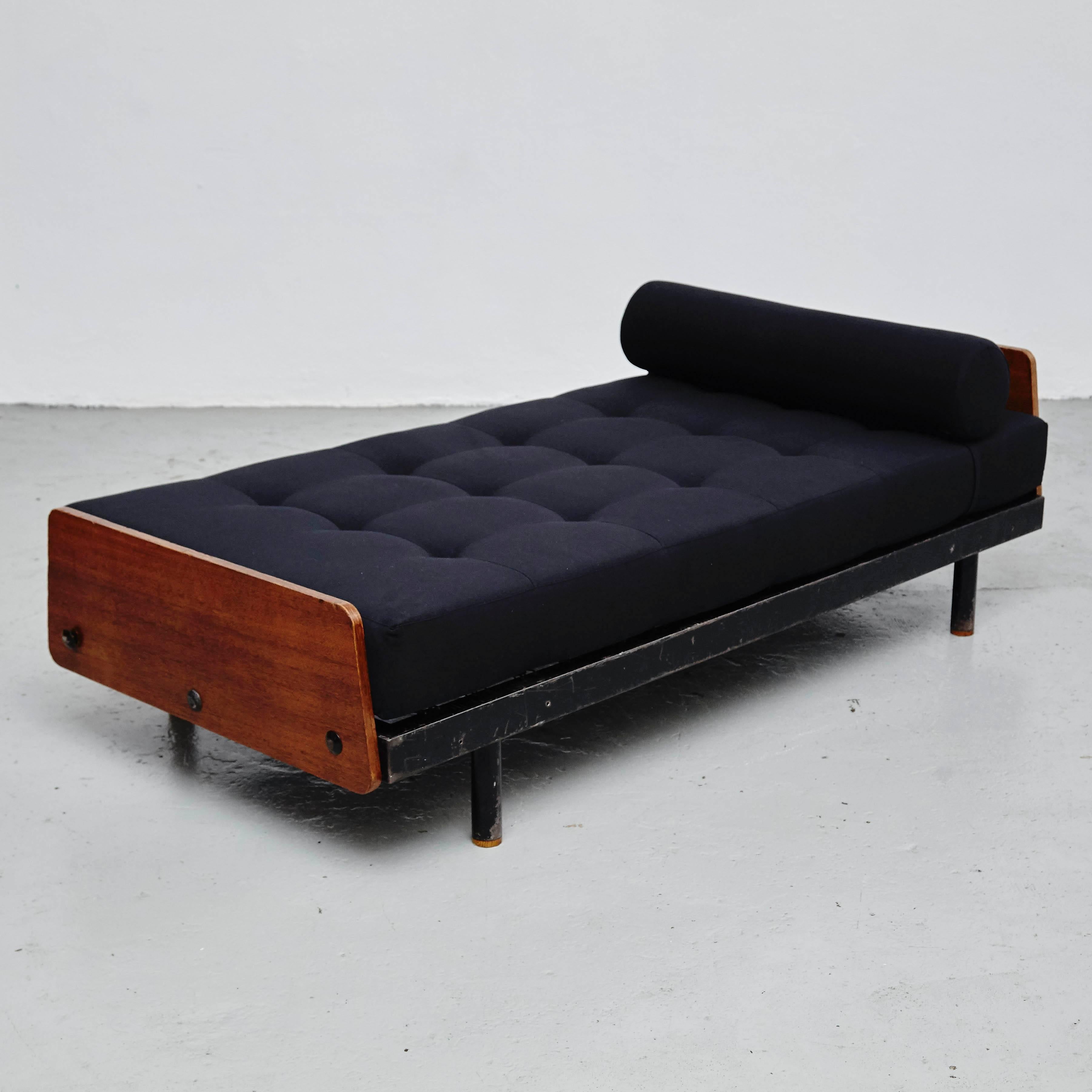 Daybed designed by Jean Prouve manufactured by Ateliers Prouve (France) circa 1950.

In good original condition with minor wear consistent with age and use, preserving a beautiful patina.

Jean Prouve (1901-1984): French Industrial and Furniture
