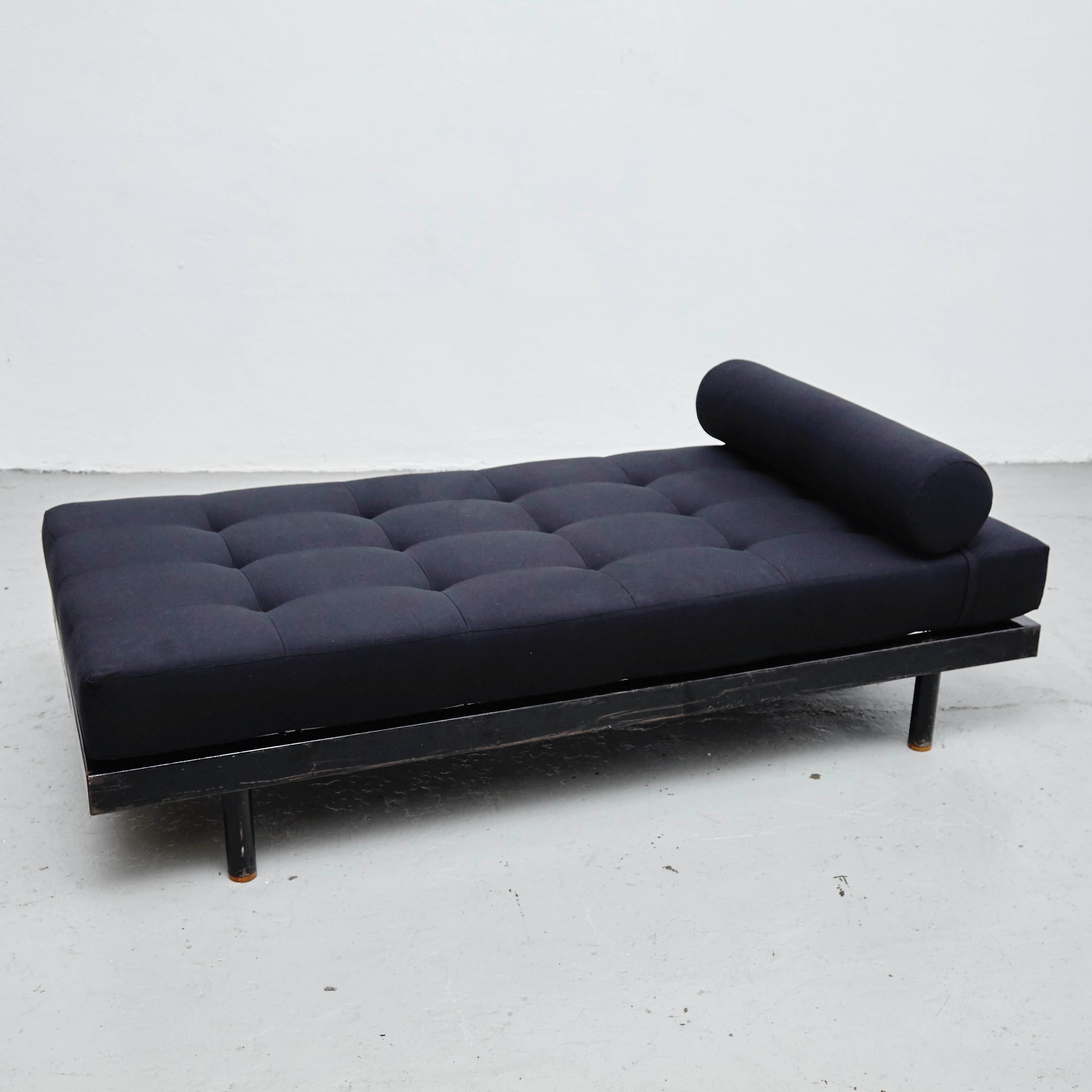 S.C.A.L. daybed designed by Jean Prouve.
Manufactured by Ateliers Prouve, France, circa 1950.
Metal frame, wood, new upholstery.

In good original condition, with minor wear consistent with age and use, preserving a beautiful patina.

Jean