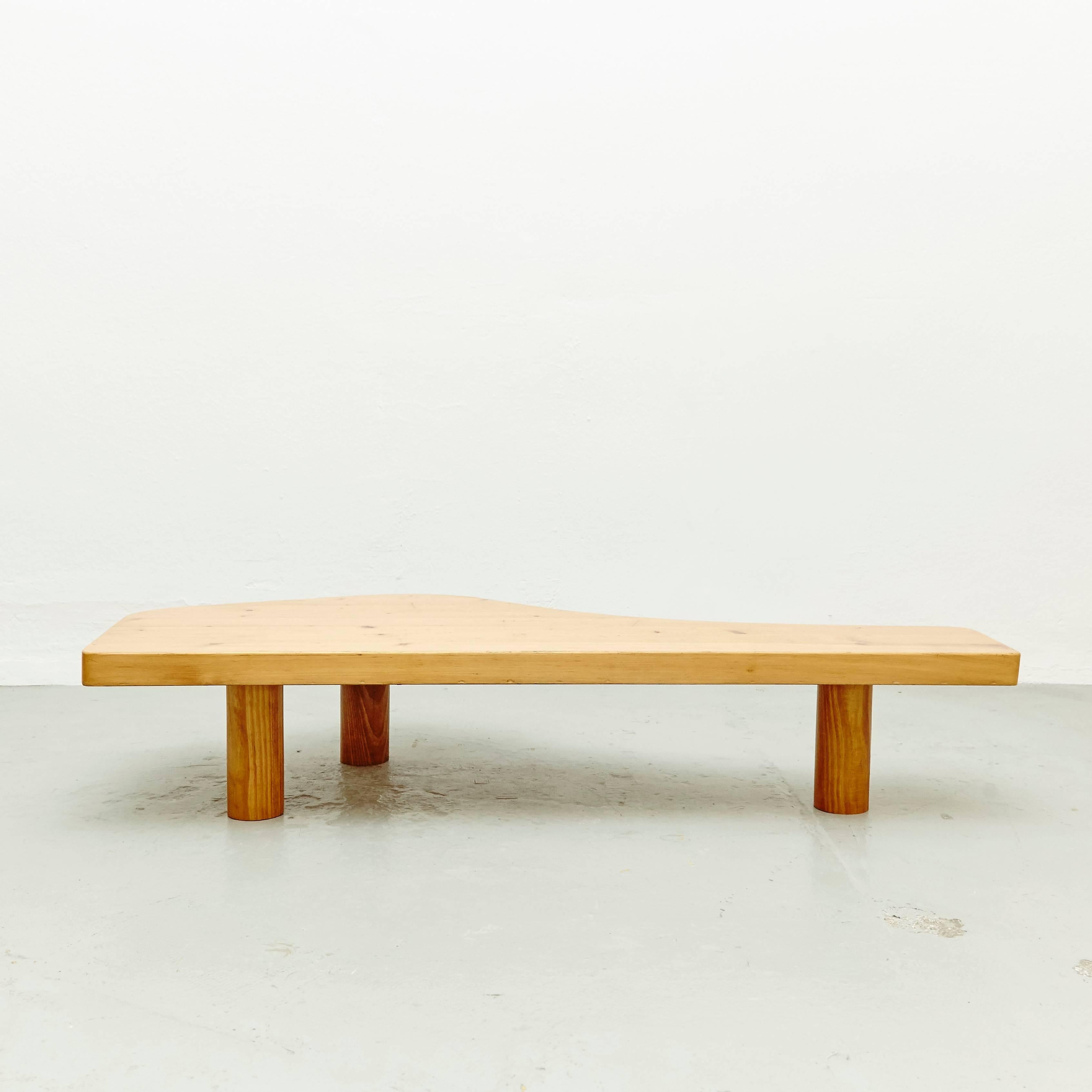 Free-form low table by Charlotte Perriand for Les Arcs ski resort, circa 1960, manufactured in France.
Pinewood.

Probably it was manufactured by the previuos owner circa 1970 using and originald Perriand table from Les Arcs Bar and adding three