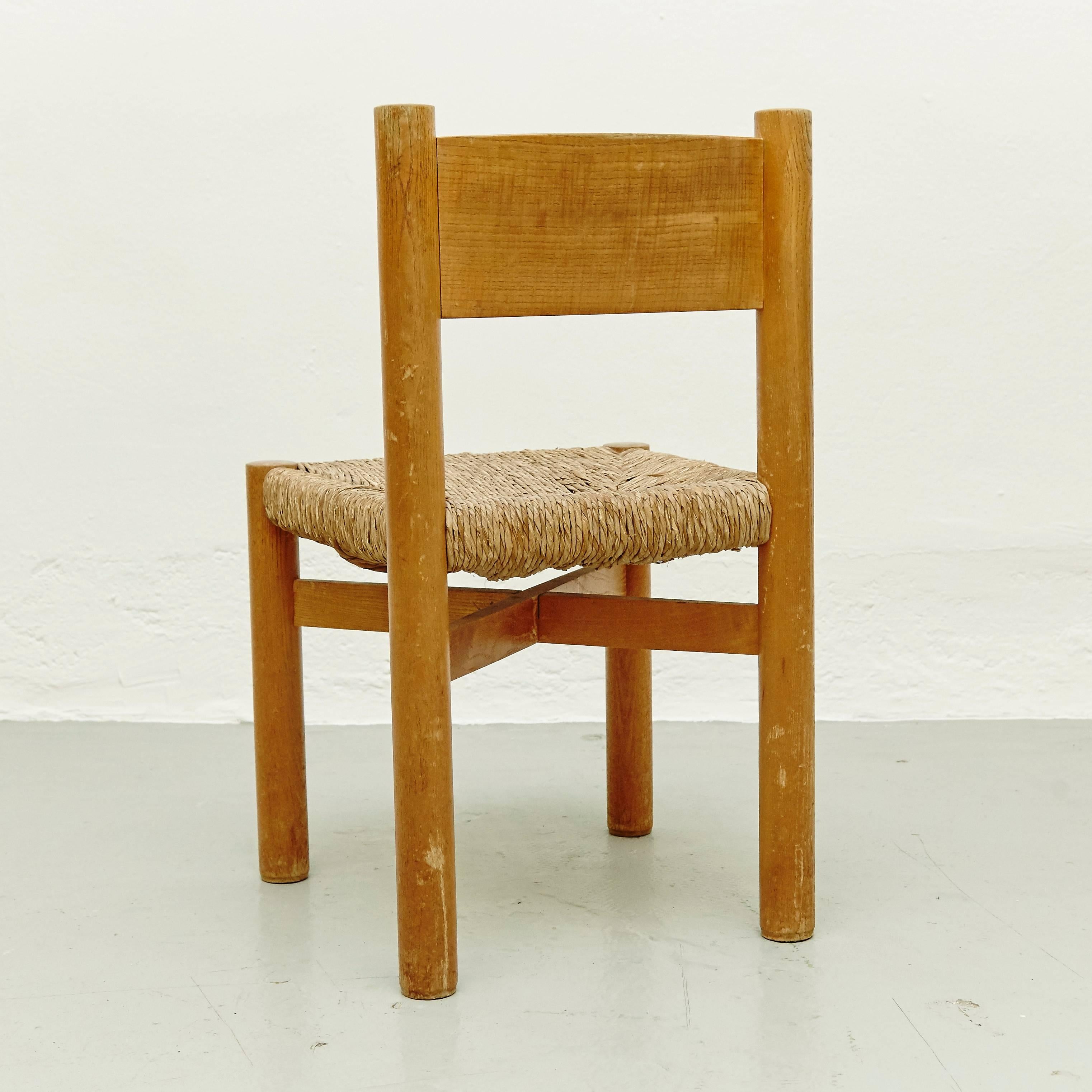 Chair model meribel, designed by Charlotte Perriand, circa 1950, manufactured in France.

Wood and rattan.

In good original condition, with minor wear consistent with age and use, preserving a beautiful patina.

Charlotte Perriand (1903-1999)