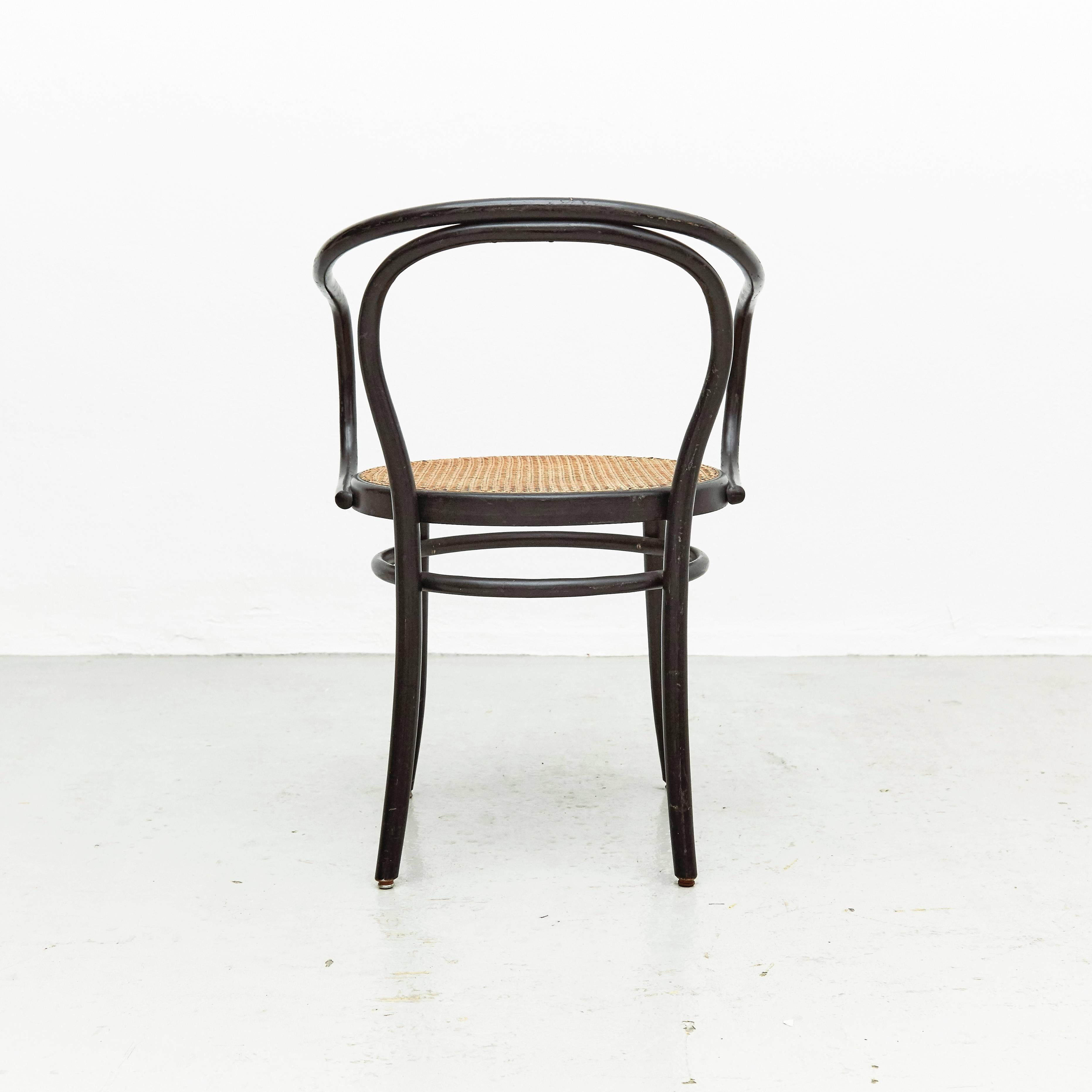 Armchair designed in the style of Thonet, made by unknown manufacturer, circa 1940.

In good original condition, preserving a beautiful patina, with minor wear consistent with age and use.