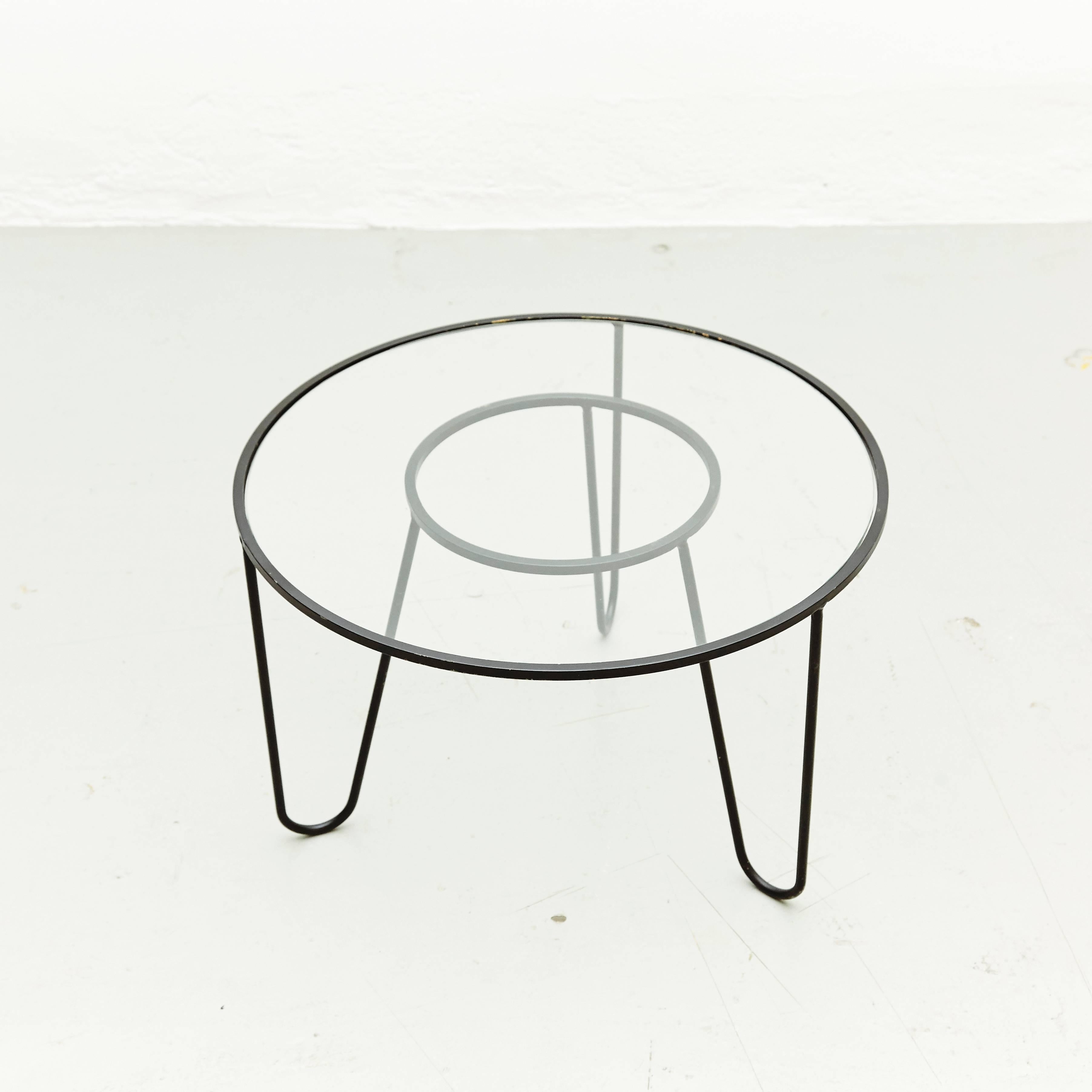 'Bellevue' coffee table designed by Mathieu Matégot.
Manufactured by Ateliers Matégot, France, circa 1950.

Lacquered metal with original paint.

In good original condition, with minor wear consistent with age and use, preserving a beautiful