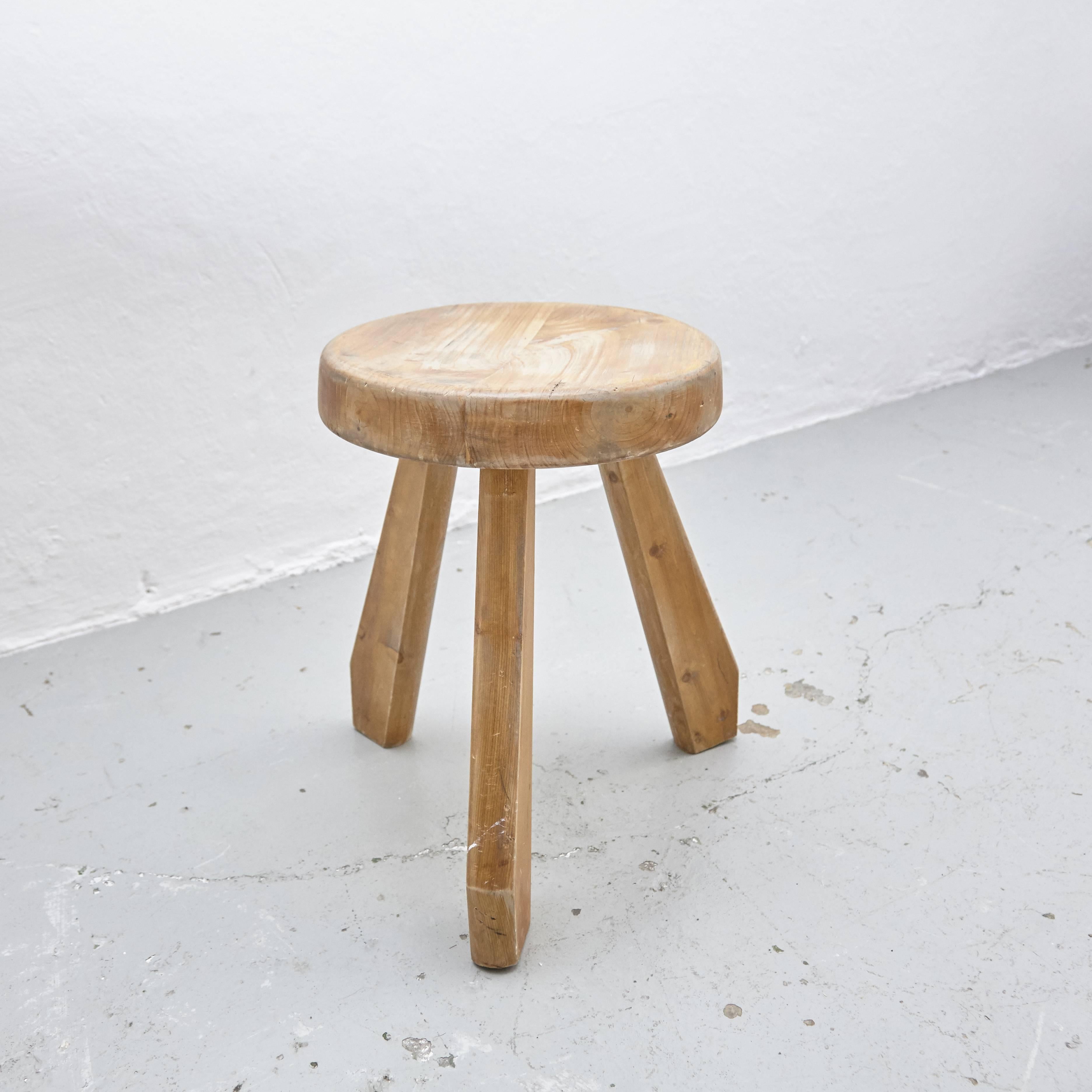 Stool, model Sandoz, designed by Charlotte Perriand, circa 1960.
Manufactured in France.
Pine wood.

In good original condition, with minor wear consistent with age and use, preserving a beautiful patina.

Charlotte Perriand (1903-1999). She