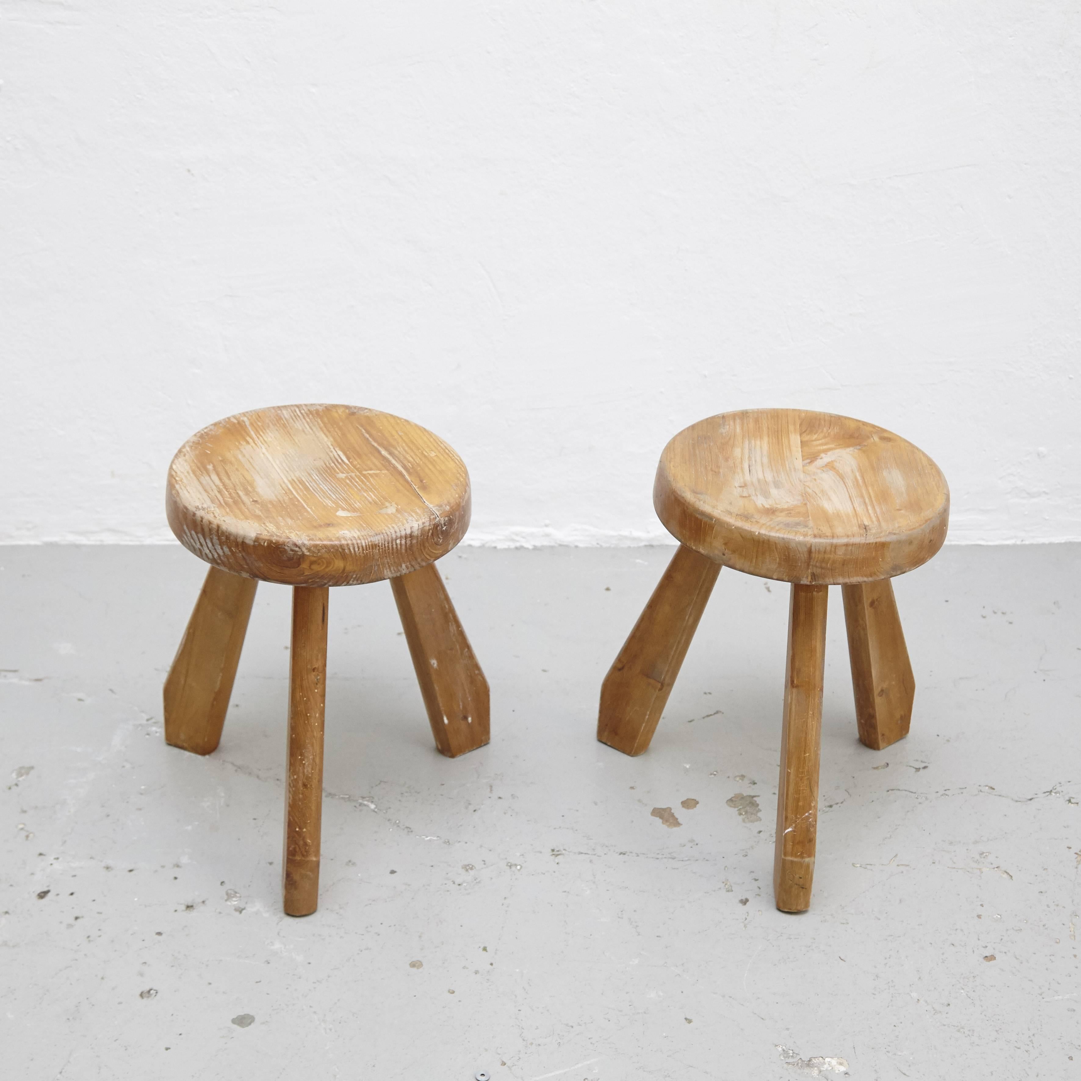 Stools, model Sandoz, designed by Charlotte Perriand, circa 1960.
Manufactured in France.
Pinewood.

In good original condition, with minor wear consistent with age and use, preserving a beautiful patina.

Charlotte Perriand (1903-1999). She