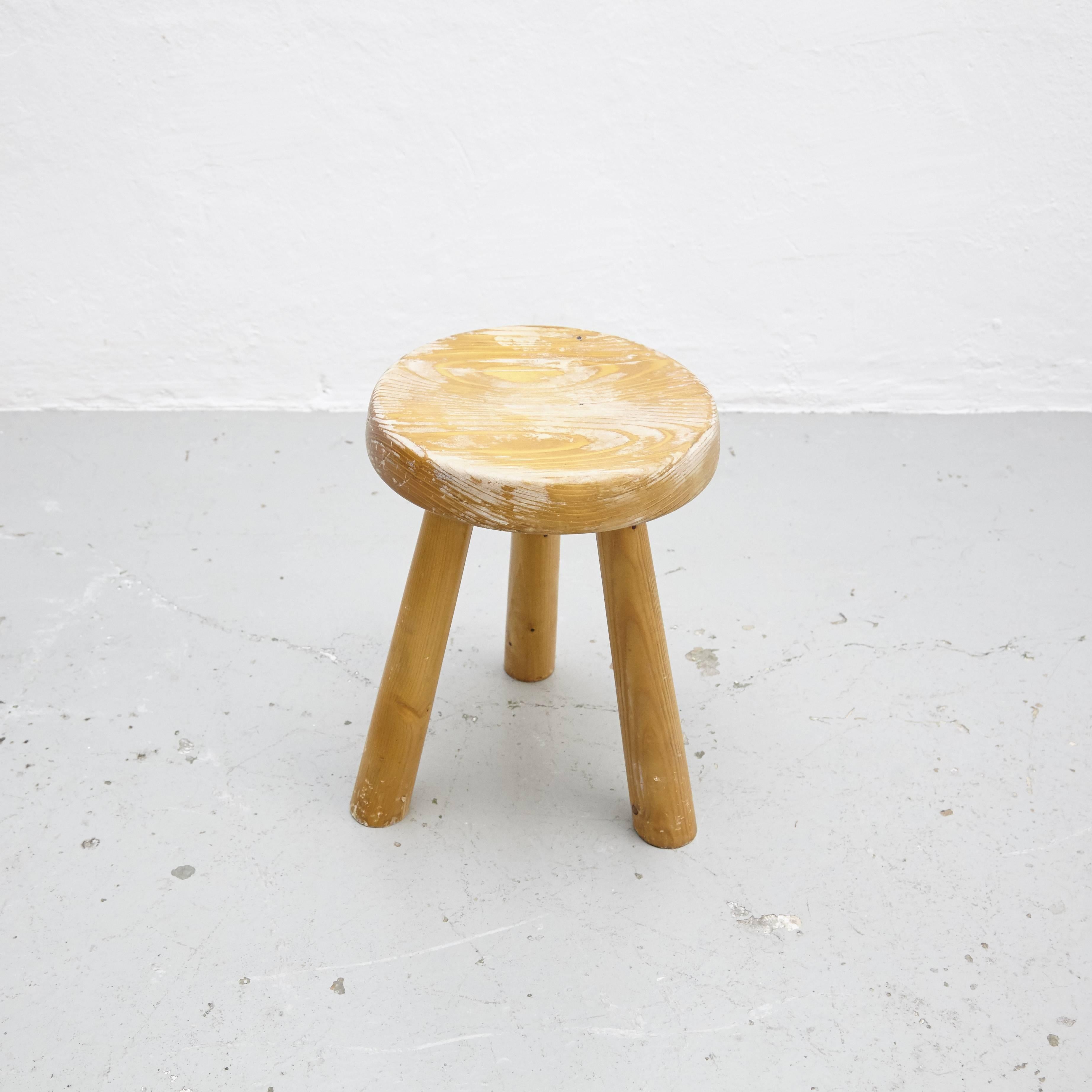 Stool designed by Charlotte Perriand, circa 1960 for Les Arcs.
Manufactured in France.
Pine wood seat.

In good original condition, preserving a beautiful patina.

Charlotte Perriand (1903 - 1999) She was born in Paris in 1903 and attended the