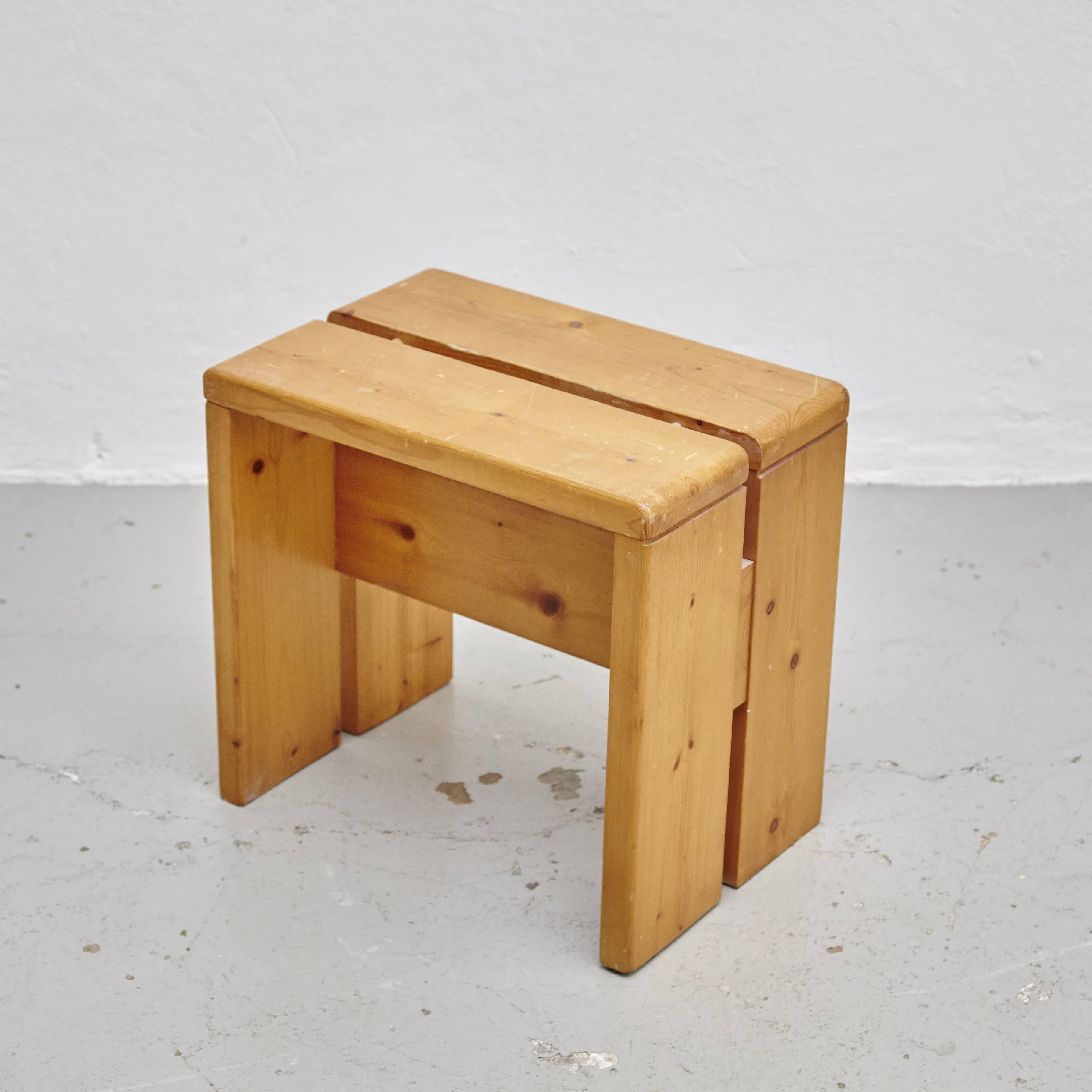 Stool designed by Charlotte Perriand for Les Arcs ski resort, circa 1960.
Manufactured in France.

Pine wood.

In original condition, with minor wear consistent with age and use, preserving a beautiful patina.

Charlotte Perriand (1903 -