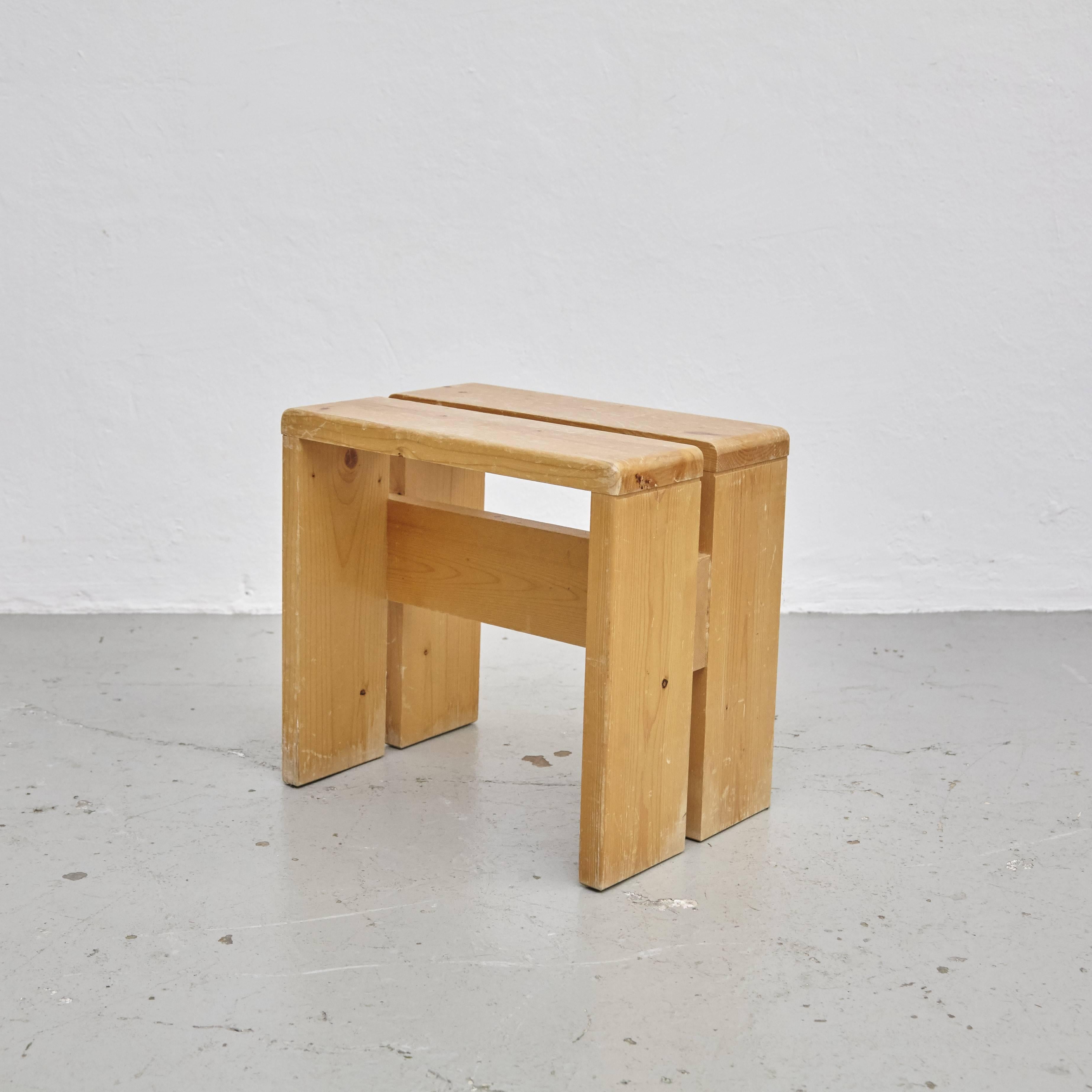 Stool designed by Charlotte Perriand for Les Arcs ski resort, circa 1960.
Manufactured in France.

Pine wood.

In original condition, with minor wear consistent with age and use, preserving a beautiful patina.

Charlotte Perriand (1903 -