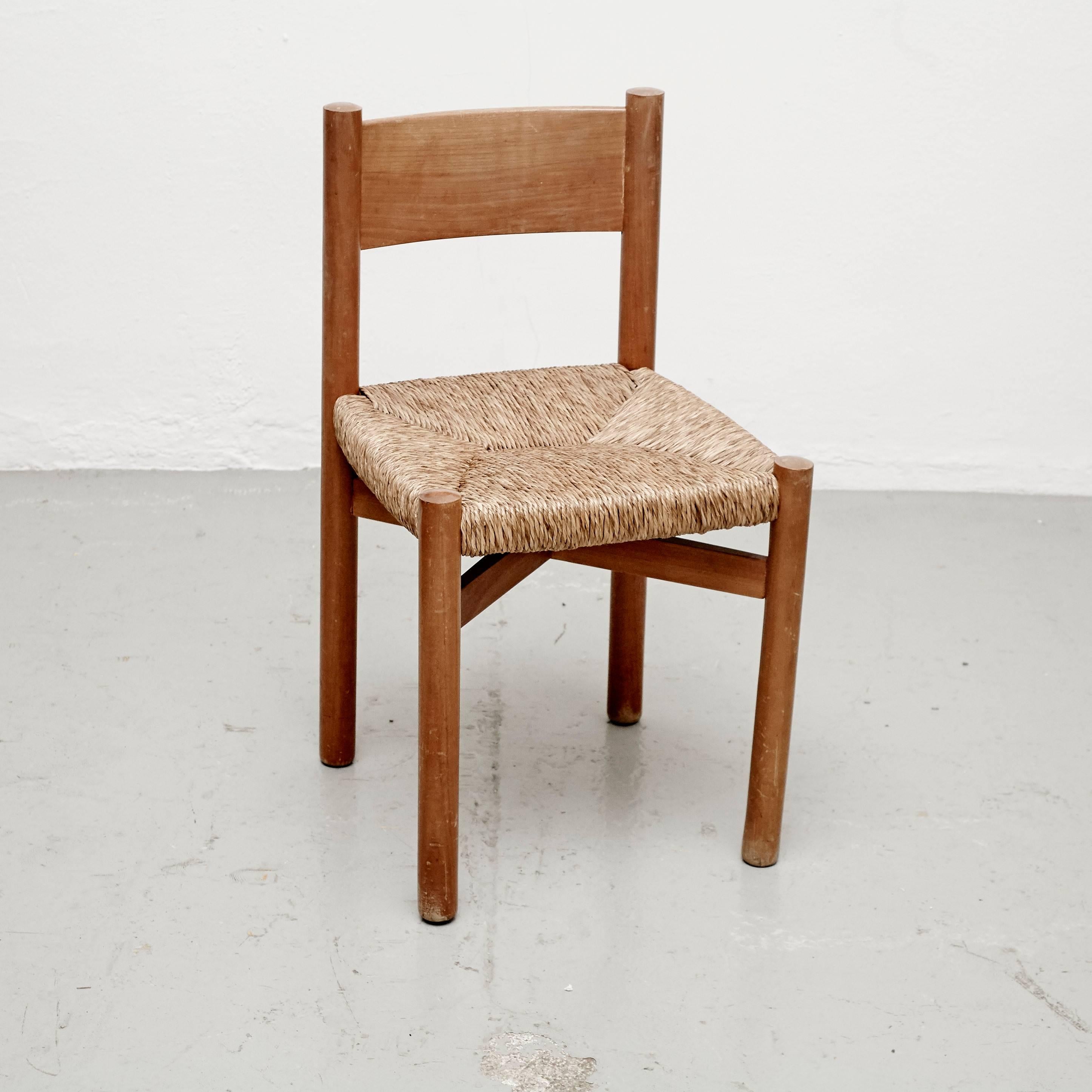 Chair model Meribel, designed by Charlotte Perriand, circa 1950, manufactured in France.

Wood and rattan.

In good original condition, with minor wear consistent with age and use, preserving a beautiful patina.

Charlotte Perriand (1903-1999)