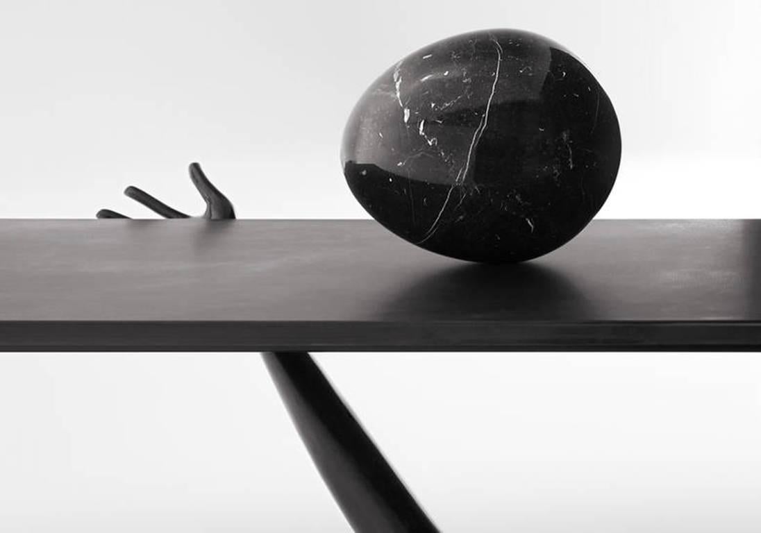 Leda low table designed by Dali manufactured by BD.

Legs in black patina not varnished.
tabletop in brushed and varnished brass, black varnished patina.
Nero Marquina marble egg on top.

51 x 190 x 61 H.cm

Year: 2009

The black label