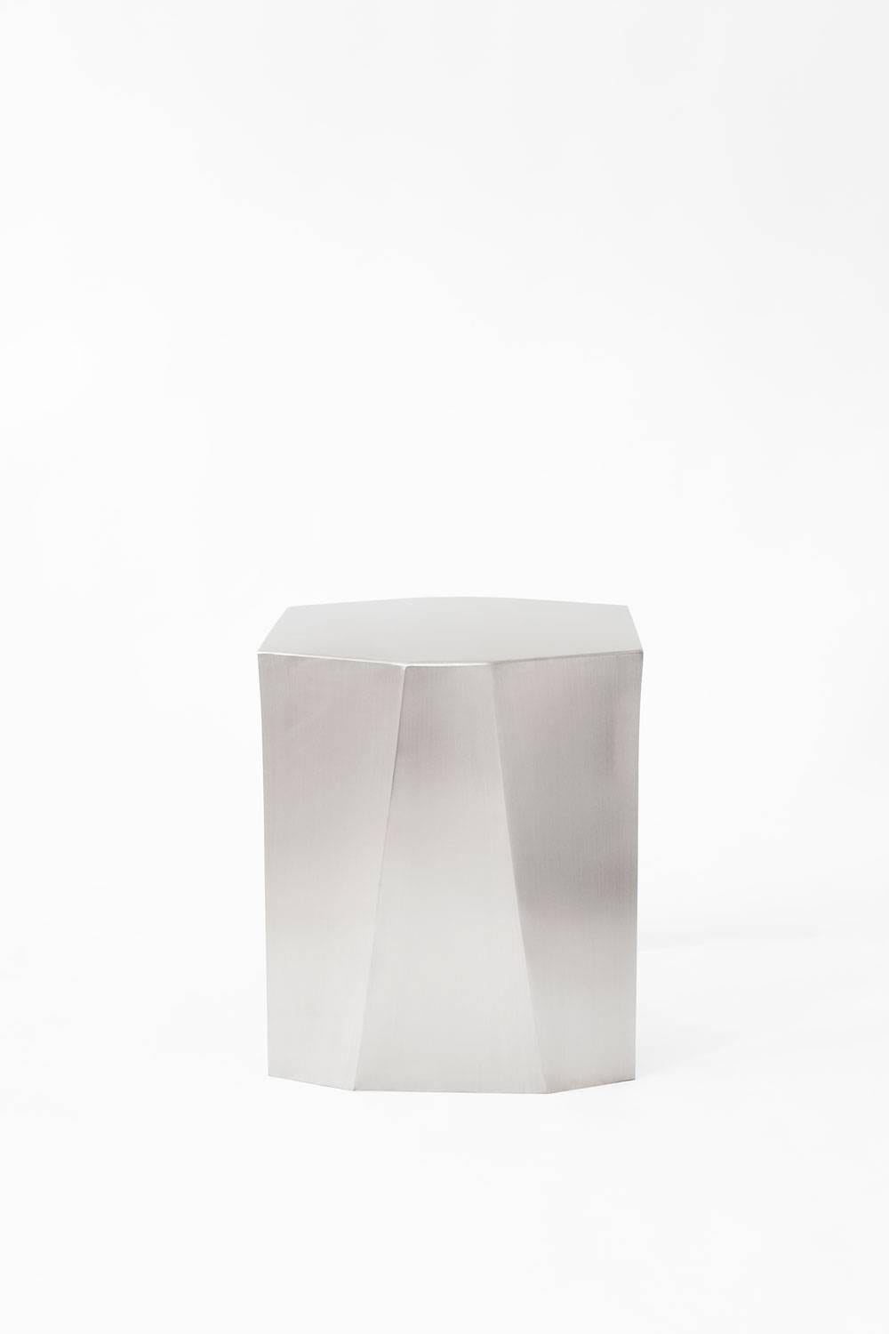 Side table designed by Adolfo Abejon.

Material: stainless steel.

Dimensions: 45 × 40 × 45 cm (L × W × H). 

Katy is a side table, but, above all, it's a feeling for sculpture handmade in a stainless steel sheet. Katy is born performing