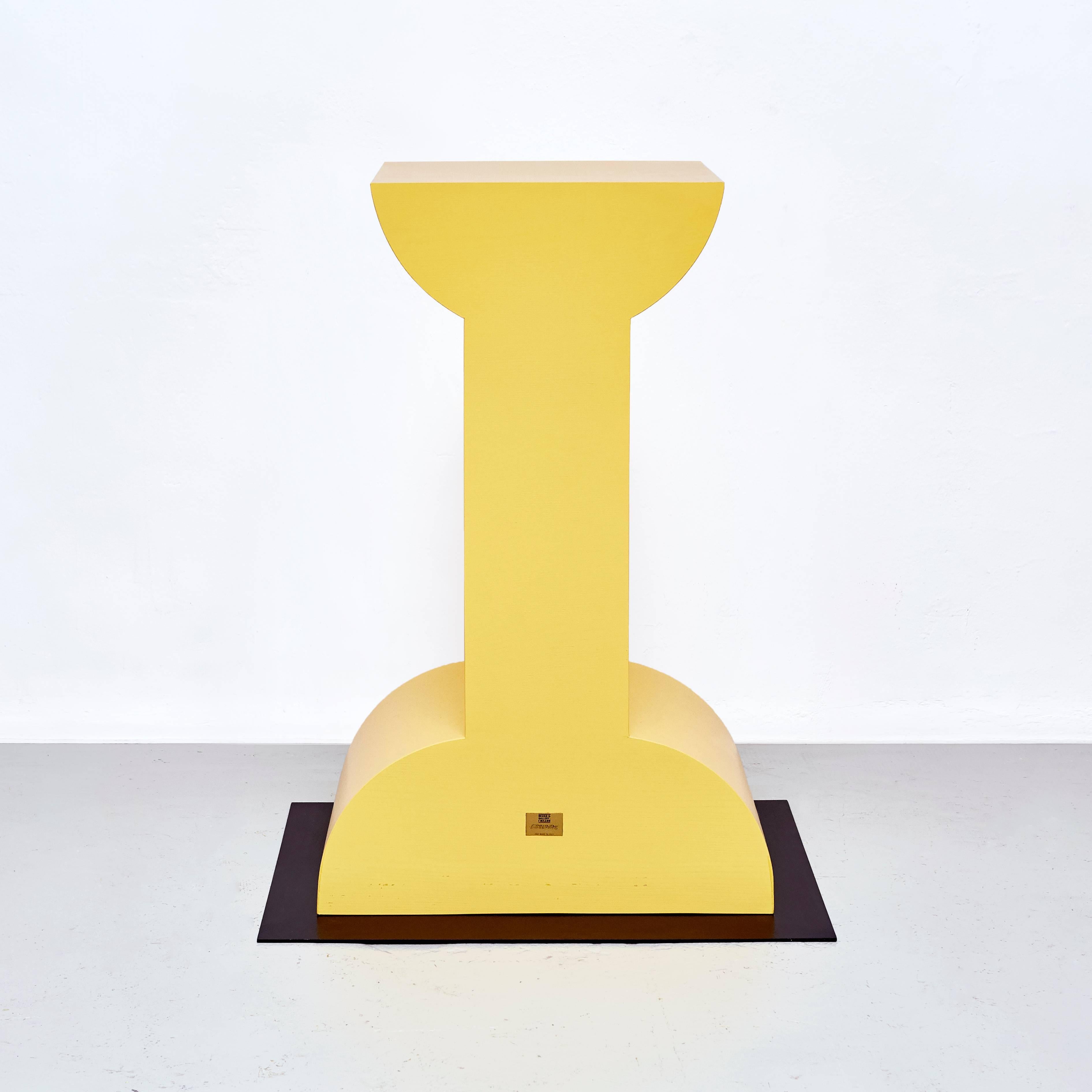Pedestal Missionario designed by Ettore Sottsass in 1992 edited by Design Gallery Milano.

With metal plaque “ design/gallery/milano/Ettore Sottsass/1992 made in italy.” From the Ruins 

Wood, metal.

In original condition, with wear